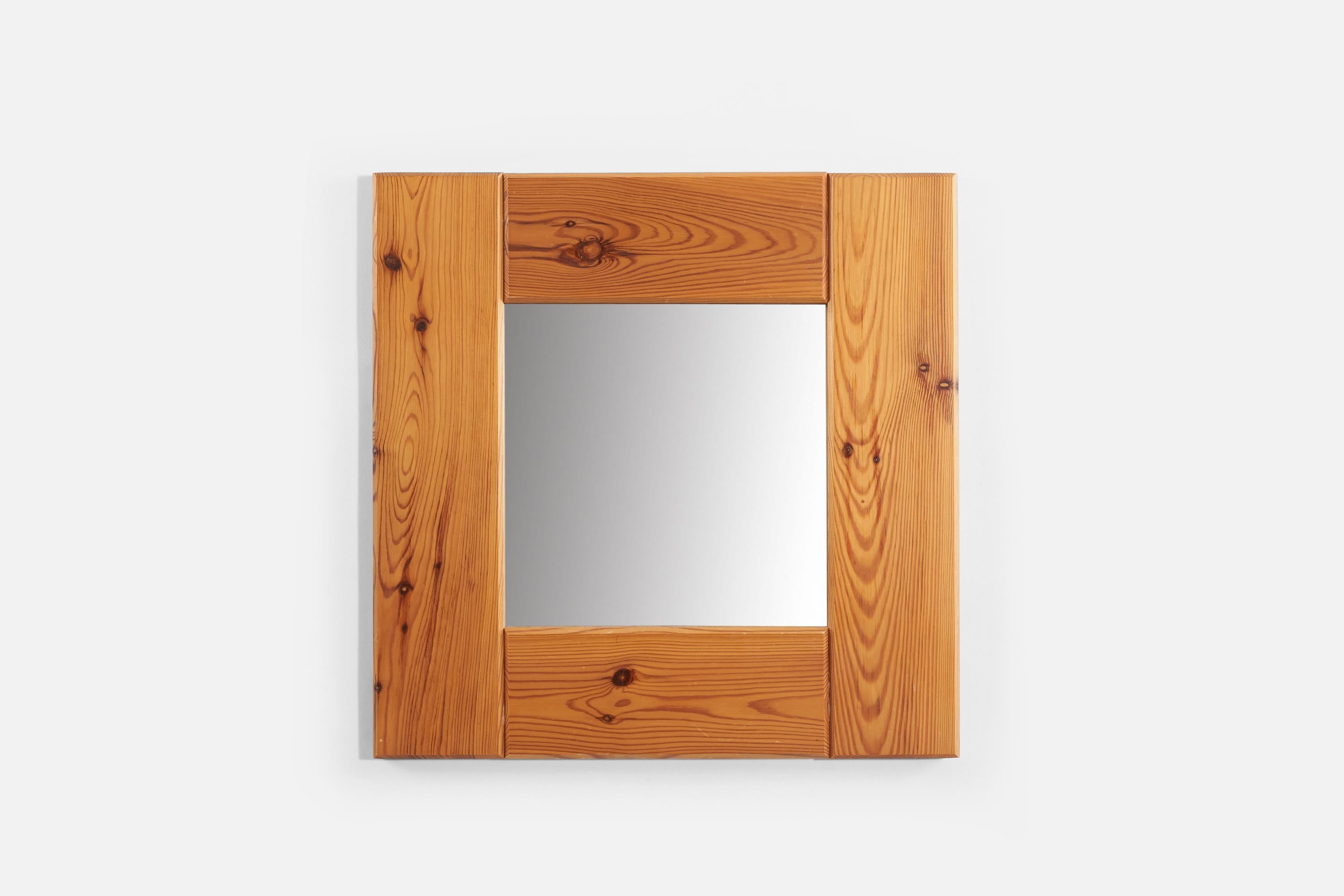A solid pine wall mirror produced in Sweden, 1950s.
 