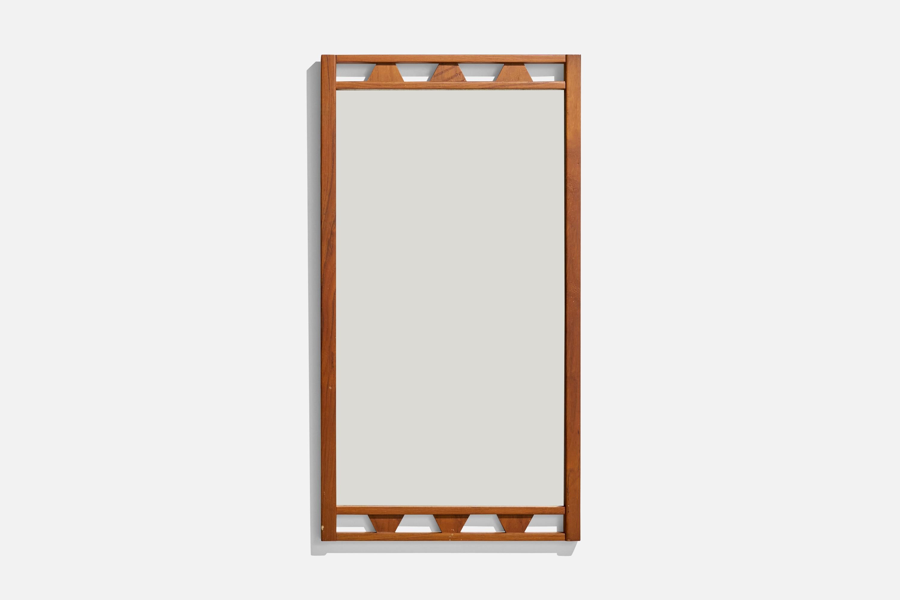 Espejo de pared de teca diseñado y fabricado en Suecia, años 50.