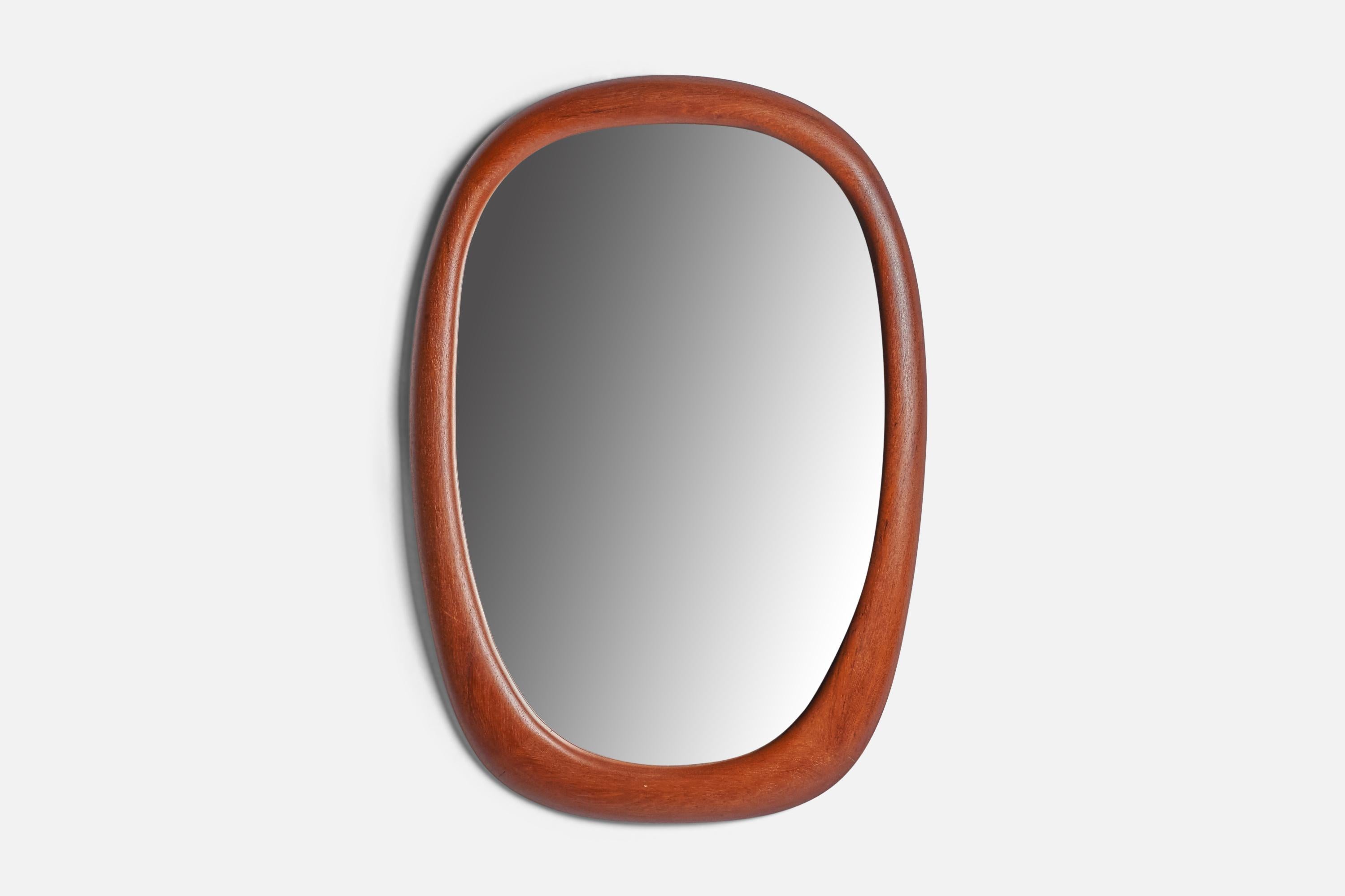 A teak wall mirror designed and produced in Sweden, 1950s