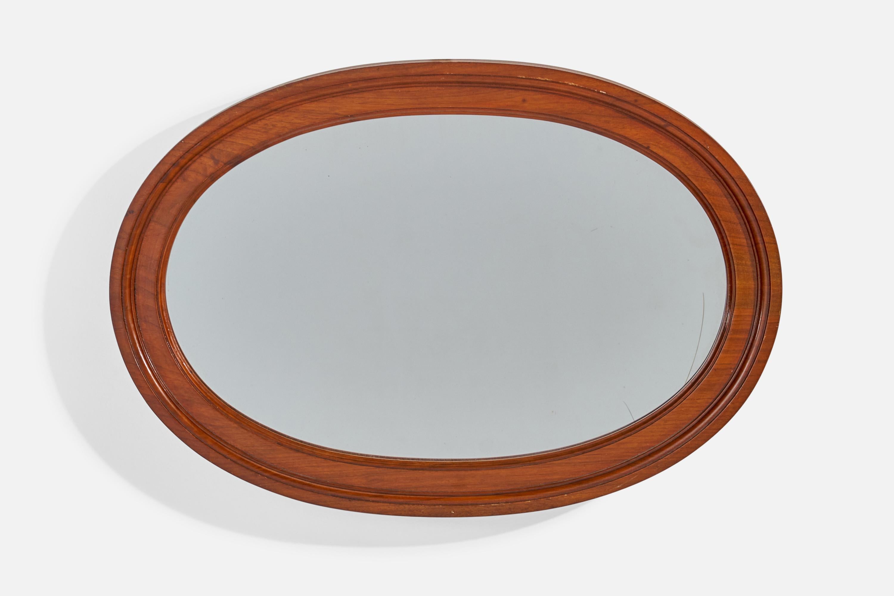 A walnut wall mirror designed and produced in Sweden, c. 1930s.