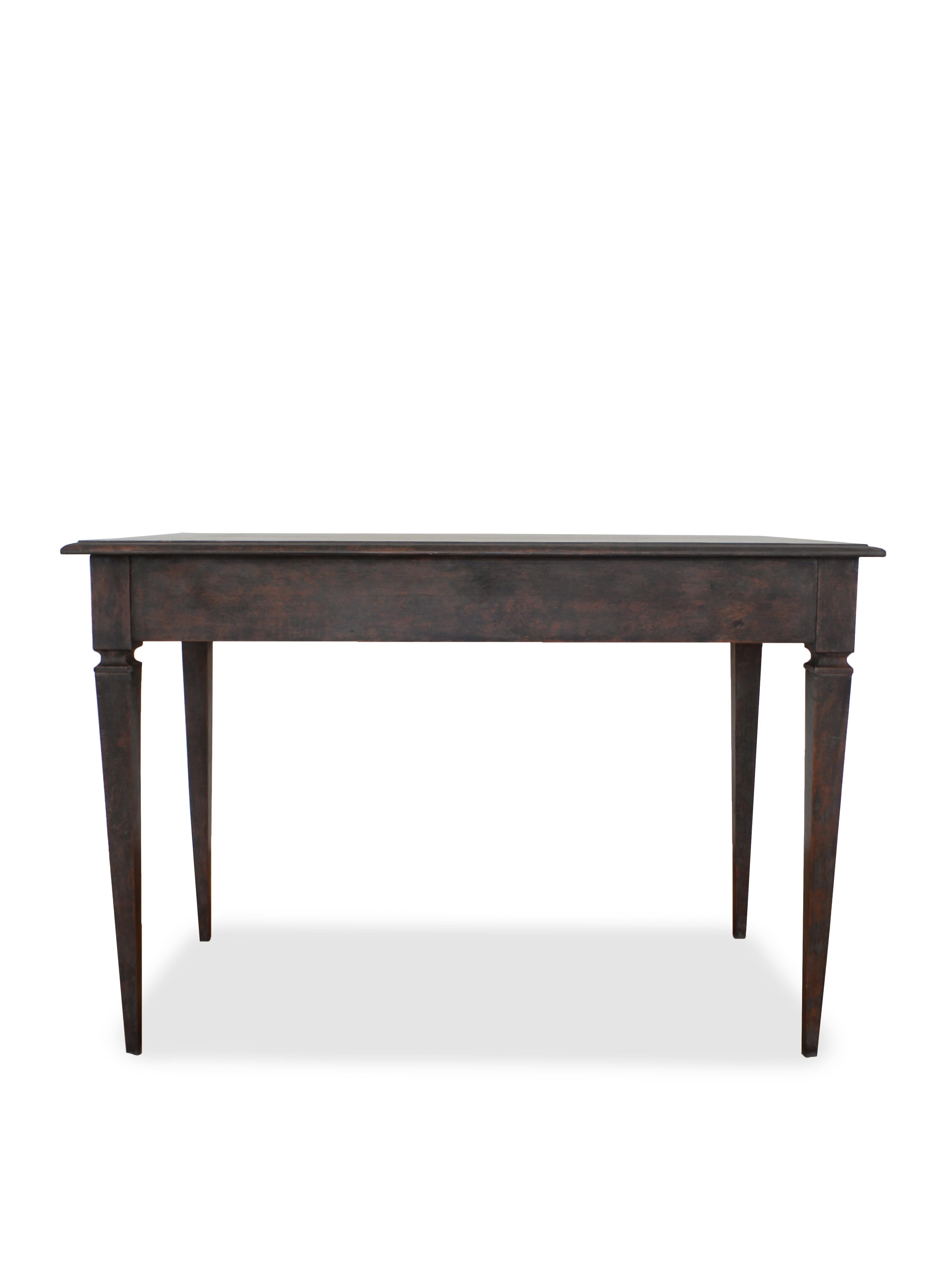 Nice desk in antique Gustavian style
Fits perfectly in any home, modern or old style

The table has straight tapered legs, 3 drawers and brass handles in typical gustavian style .
Made in Pine 
Painted in black on red in an old scandinavian way
