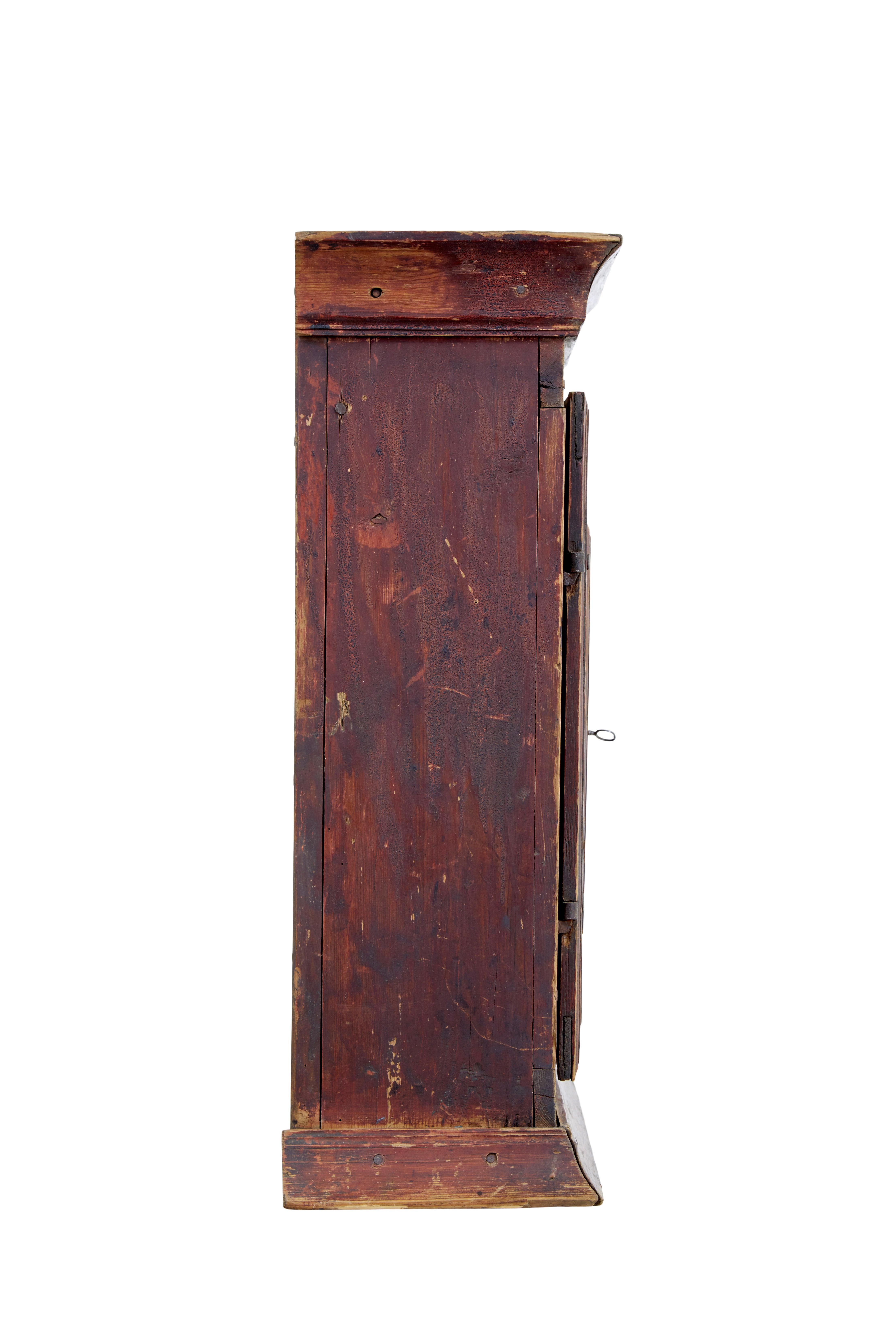 Folk Art Swedish early 19th century painted pine wall cupboard For Sale