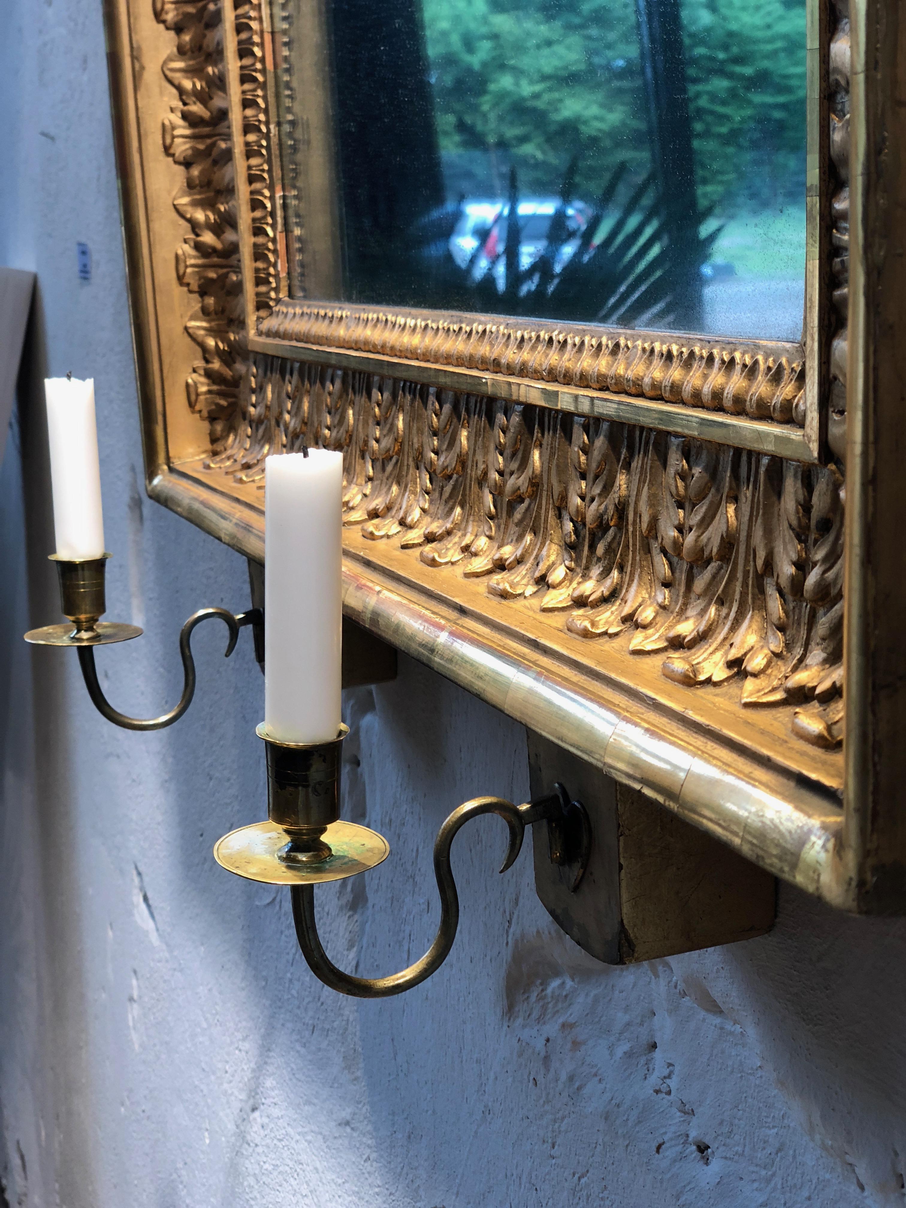 19th Century Swedish Empire Mirrored Wall Sconce with Gilded Frame and Carved Decorations For Sale