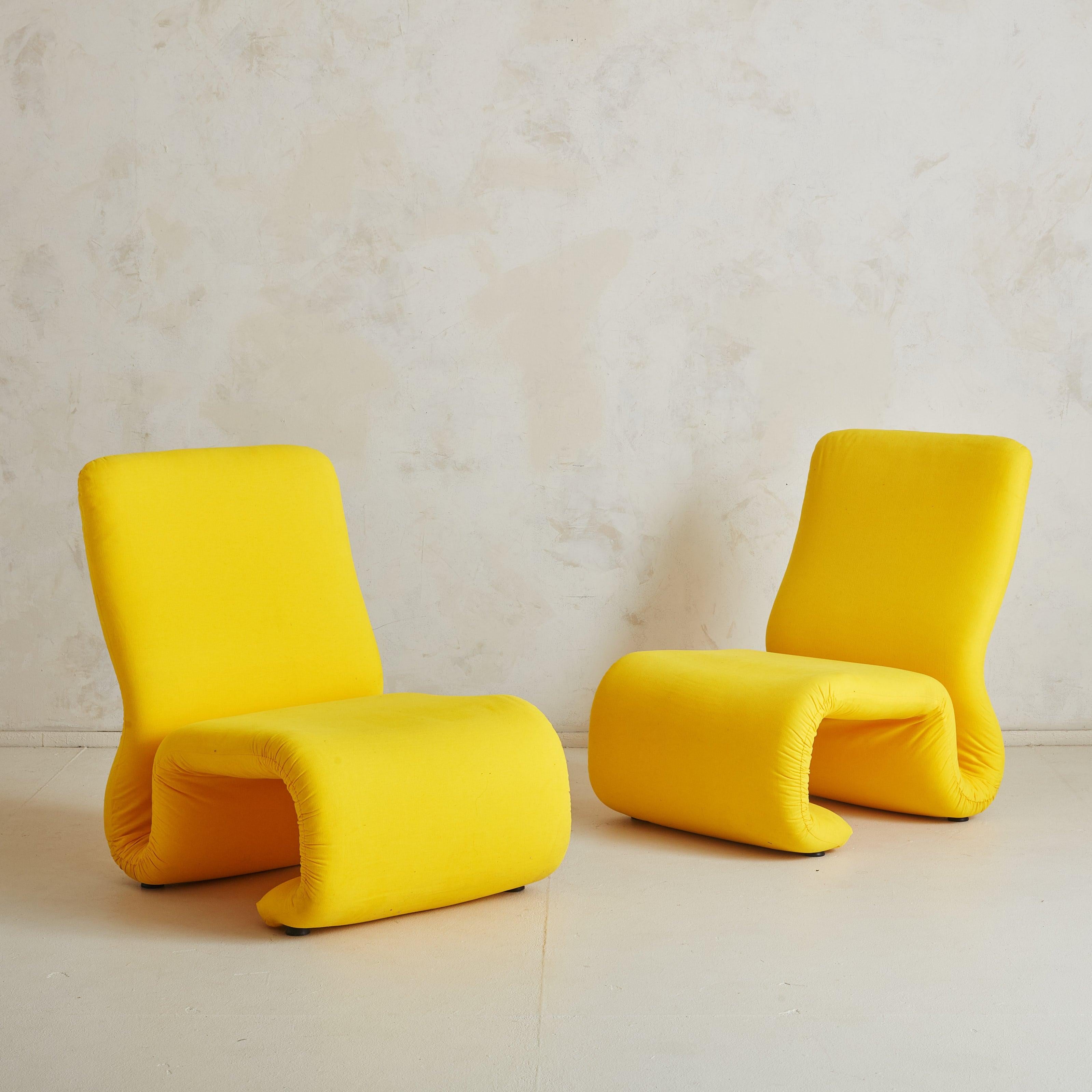 An early example of the sculptural 'Etcetera' chair by Jan Eskelius, crafted in the 1970s. This iconic Swedish design has a Space Age influence, combining an organic shape and bold curves, wrapped in vibrant yellow upholstery. We elected to keep the
