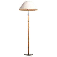 Swedish Floor Lamp in Brass and Teak from the 70's Style Paavo Tynell G075