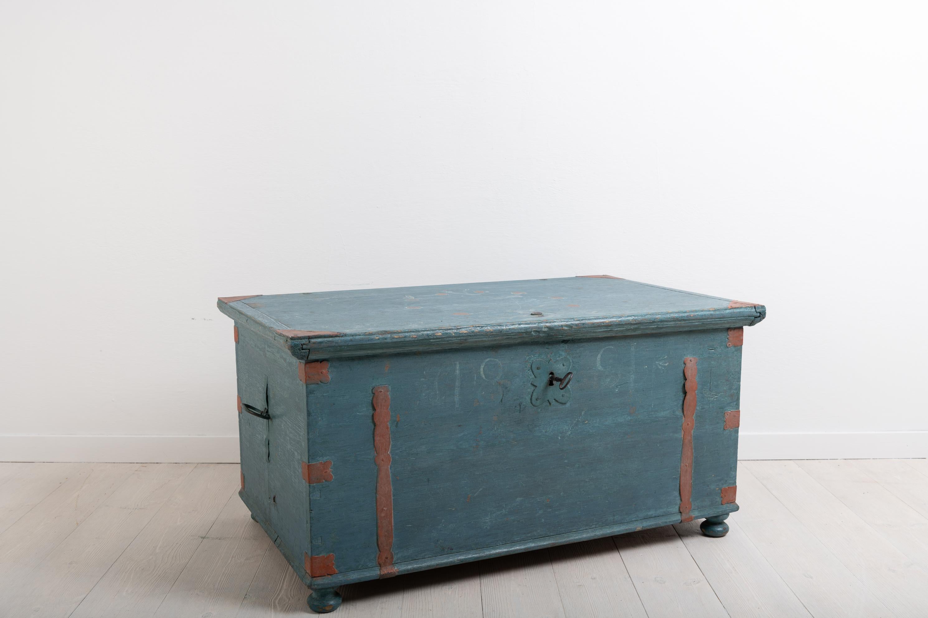 Folk art chest with original blue paint. There are traces of decorative paint and dating. Manufactured in northern Sweden, circa 1840-1860. The lock and key are original and in fully functional condition.