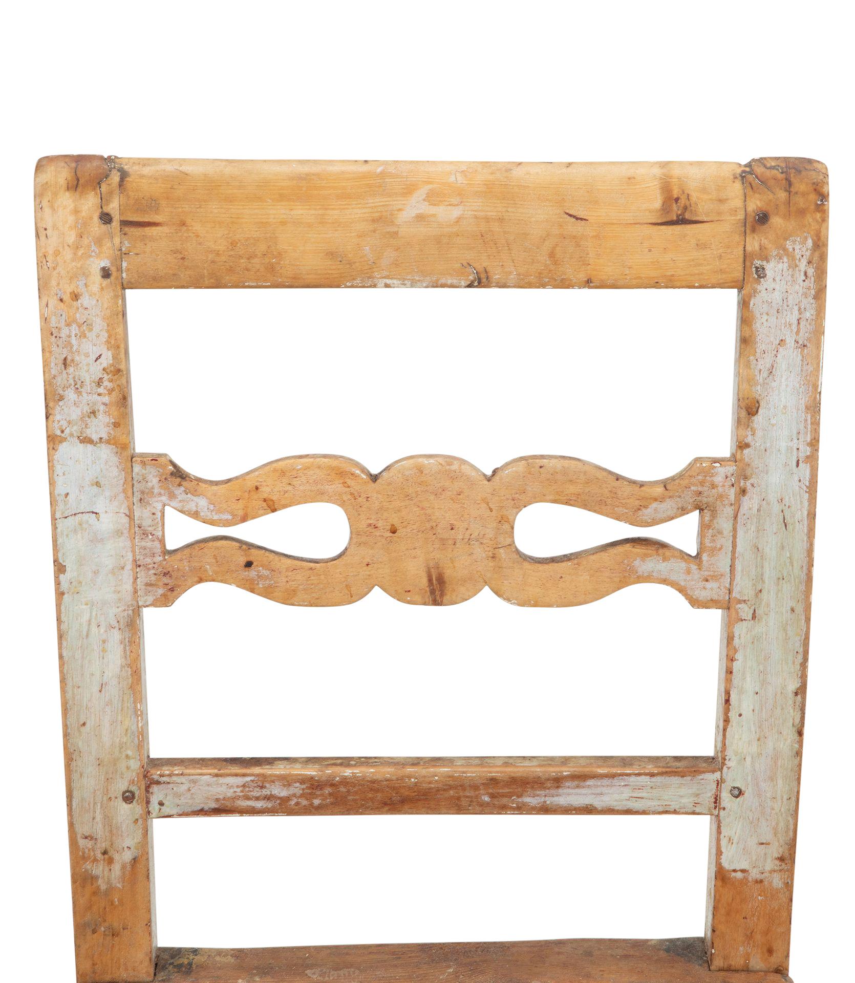 Swedish 19th Century folk art chair. 
Scraped to original paint.