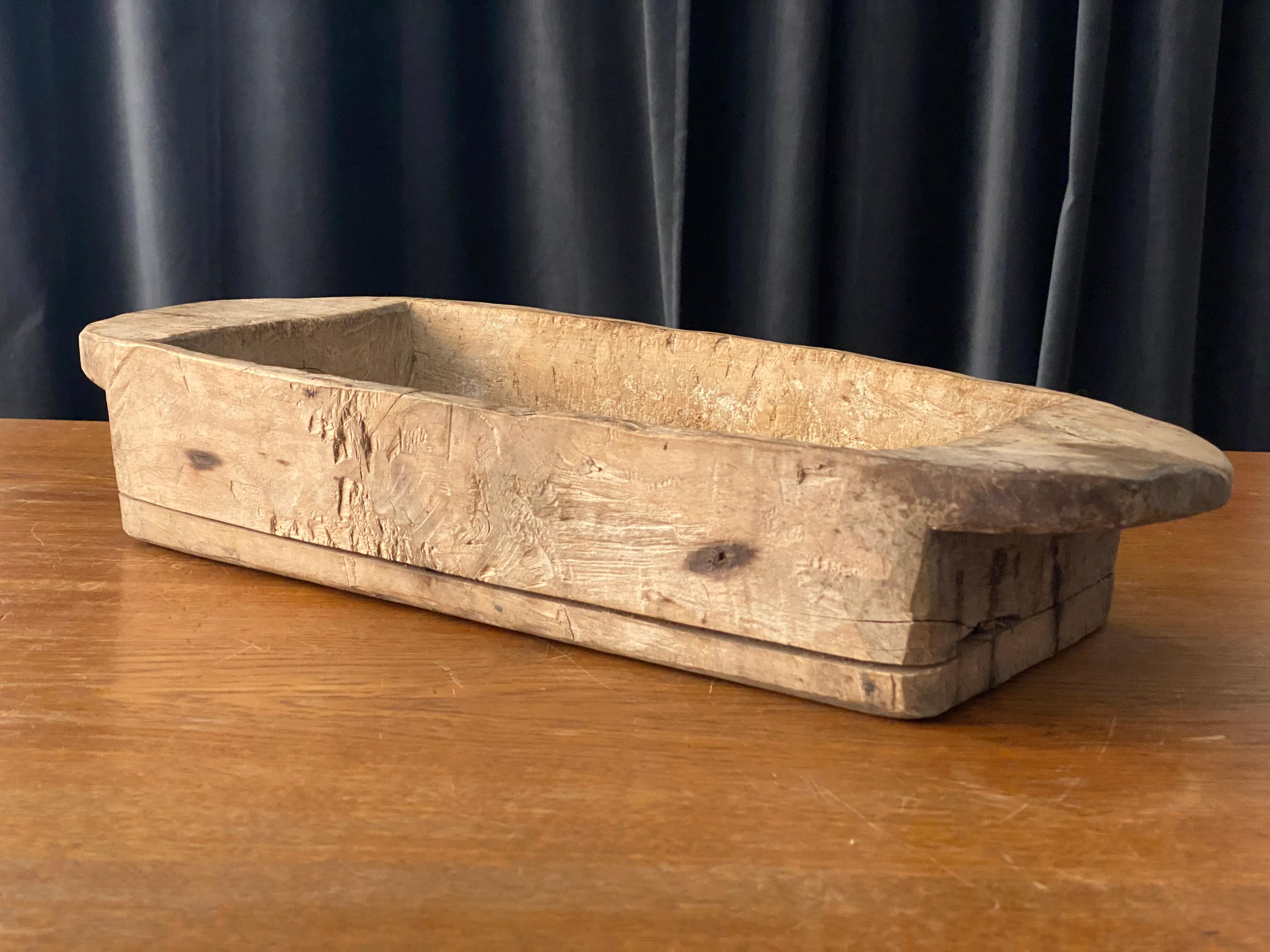 A sizable farmers handcrafted form or tray / server bowl or centerpiece. In solid wood, Signed L.B. and dated 6/4 -1901. A highly functional object with a sculptural appearance.

 