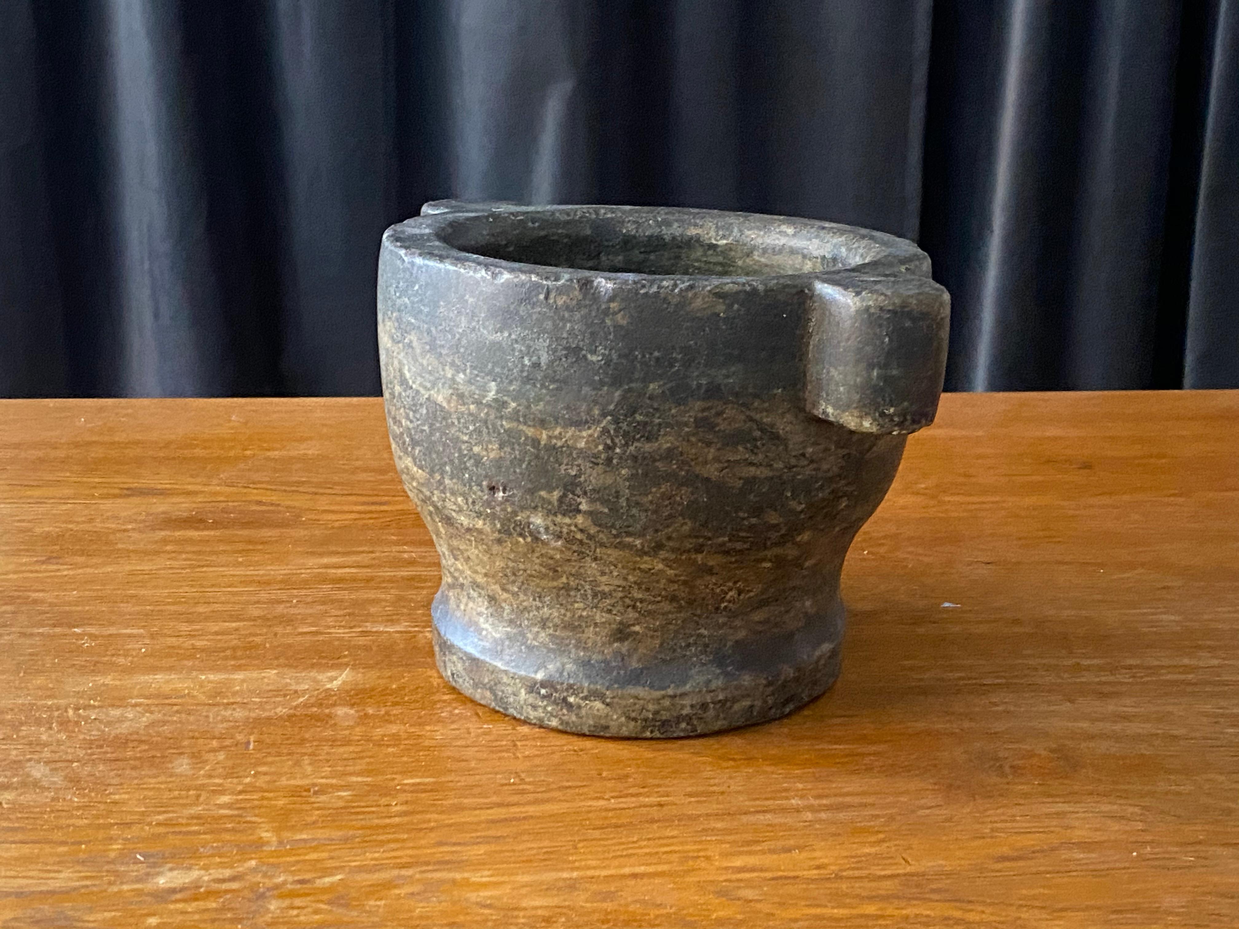 A unique sizable pestle or grinding bowl. Produced in Sweden, late 18th century. Produced in Swedish green marble, extracted in quarries in Kolmården, in the north-eastern part of the province of Östergötland in Sweden. It is fine-grained, with a