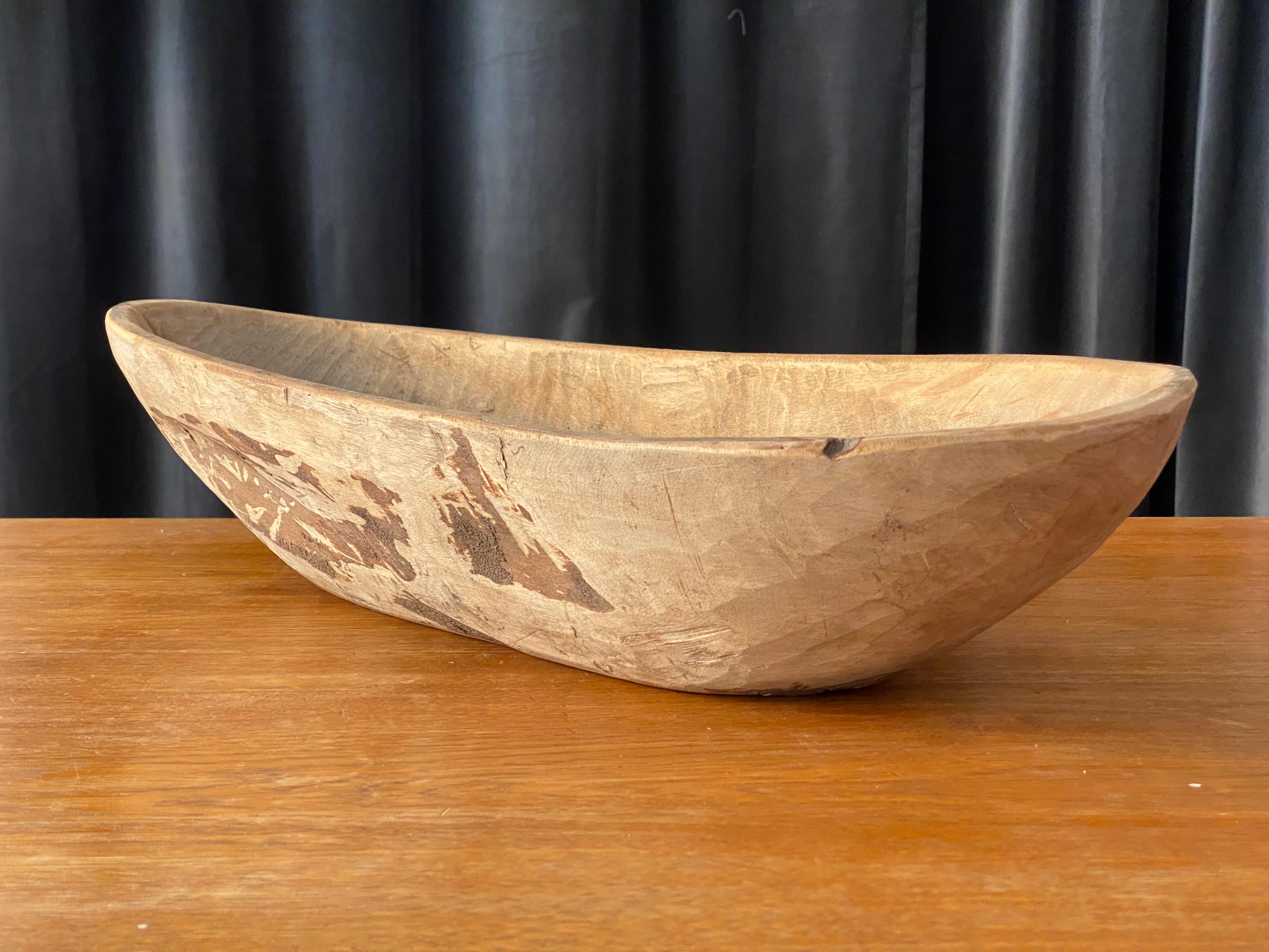 A unique large organic and early farmers wooden bowl. Signed by the artist 