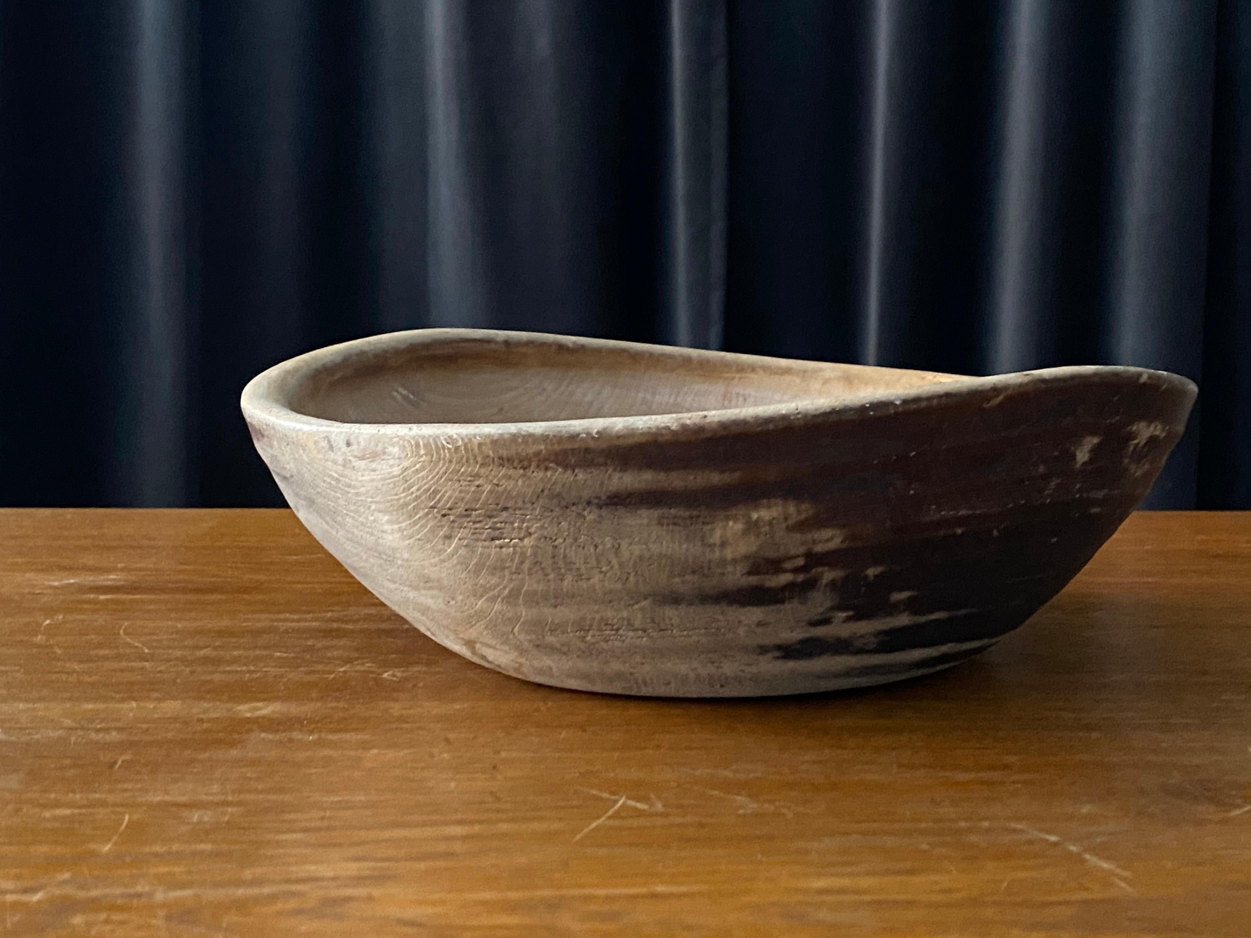 An antique and unique organic and early farmers wooden bowl. With highly appealing patina, Produced in Sweden, 19th century.
 