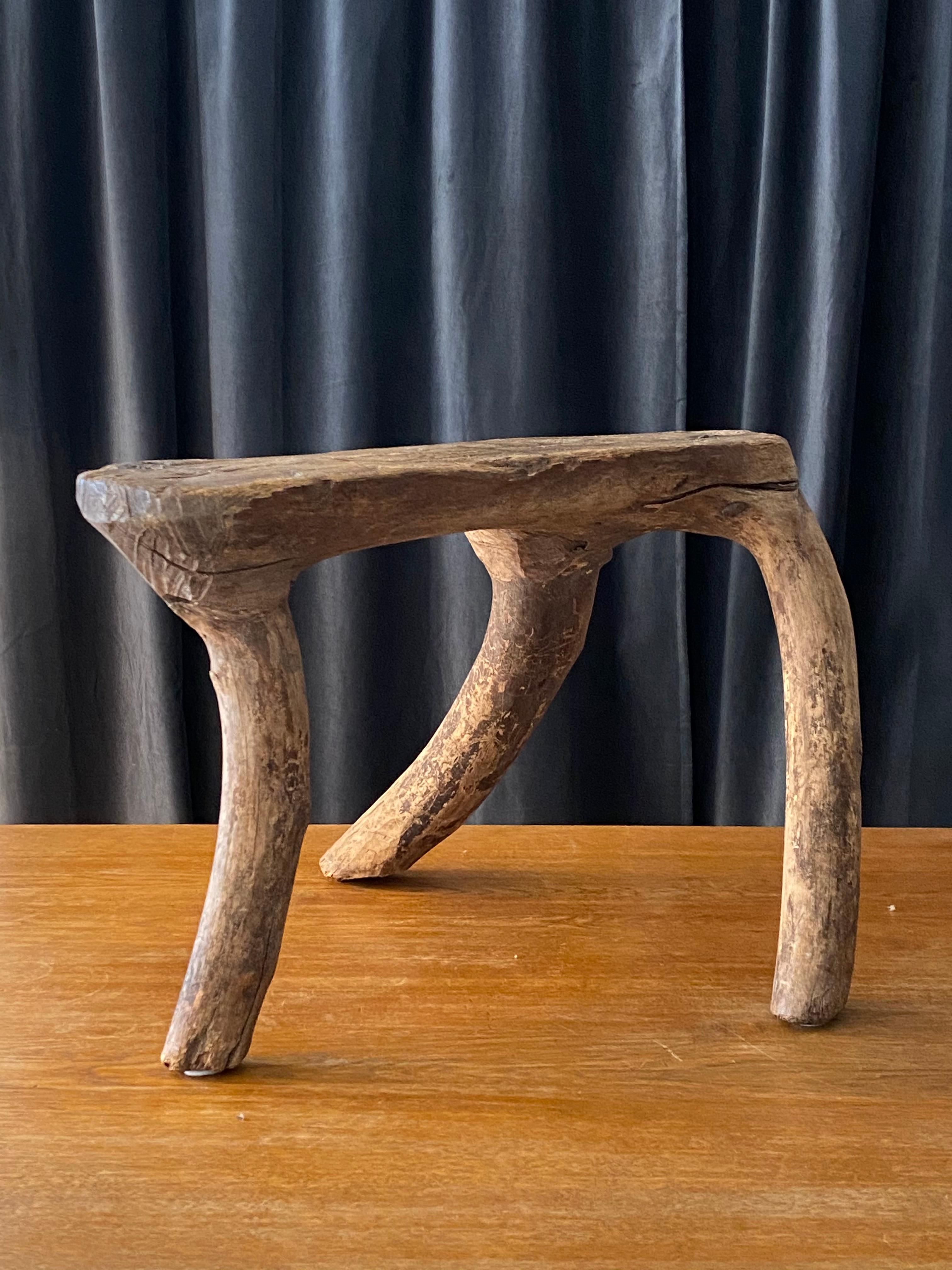 A unique organic and farmers wooden stool, 19th century. Signed 