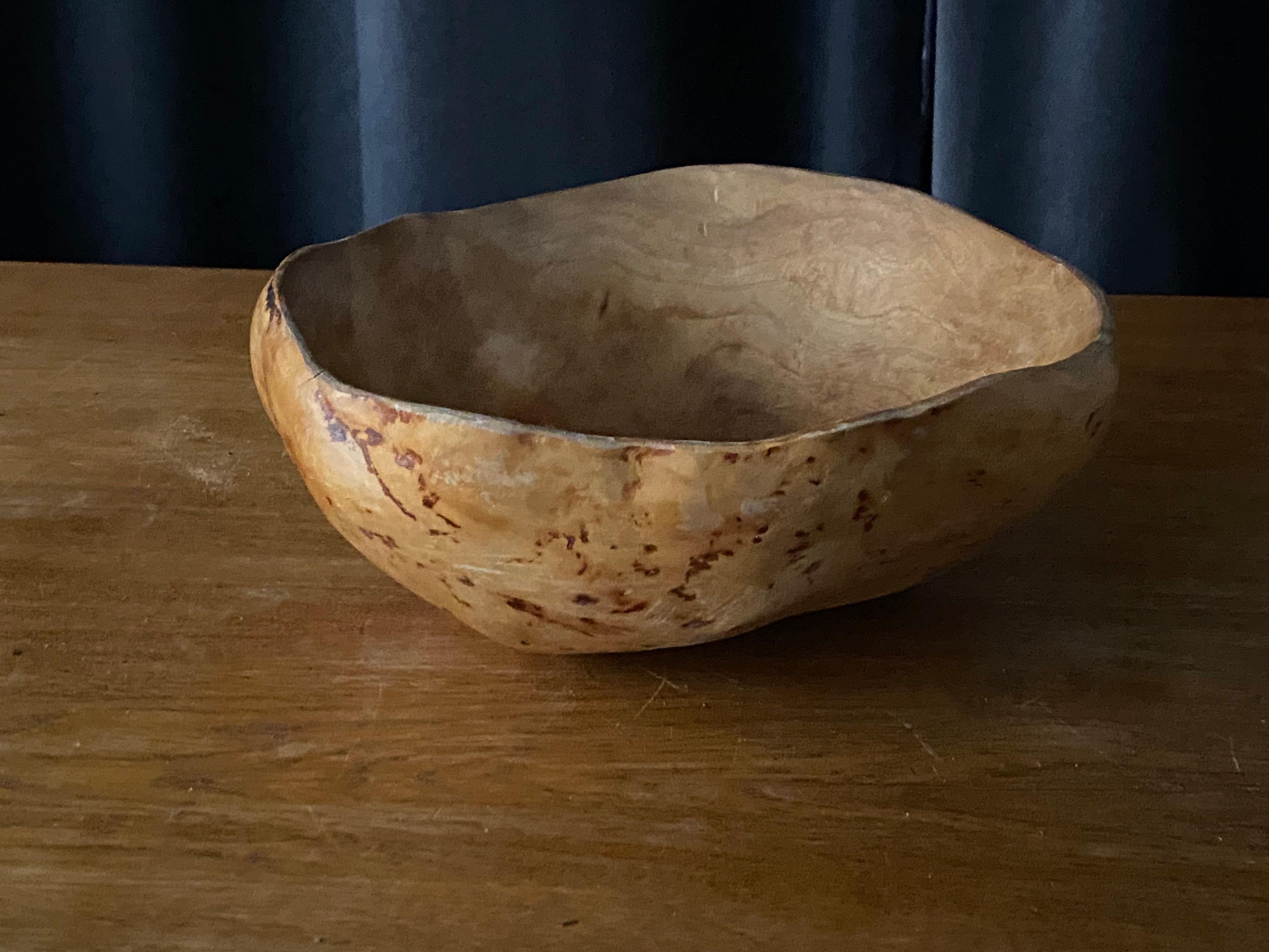 An antique, unique organic farmers wooden bowl so called 