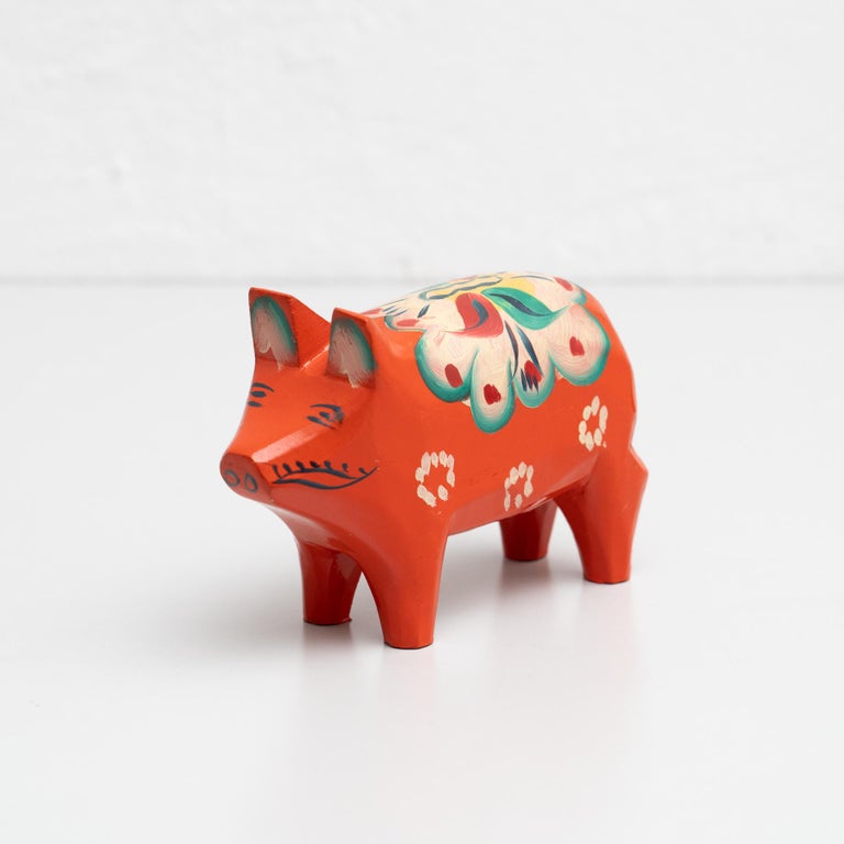 Handpainted Swedish wooden traditional Dala pig toy.

Designed by Nils Olsson in Sweden, circa 1960.
Materials:
Wood

In original condition, with minor wear consistent with age and use, preserving a beautiful patina.

The Dala Horse