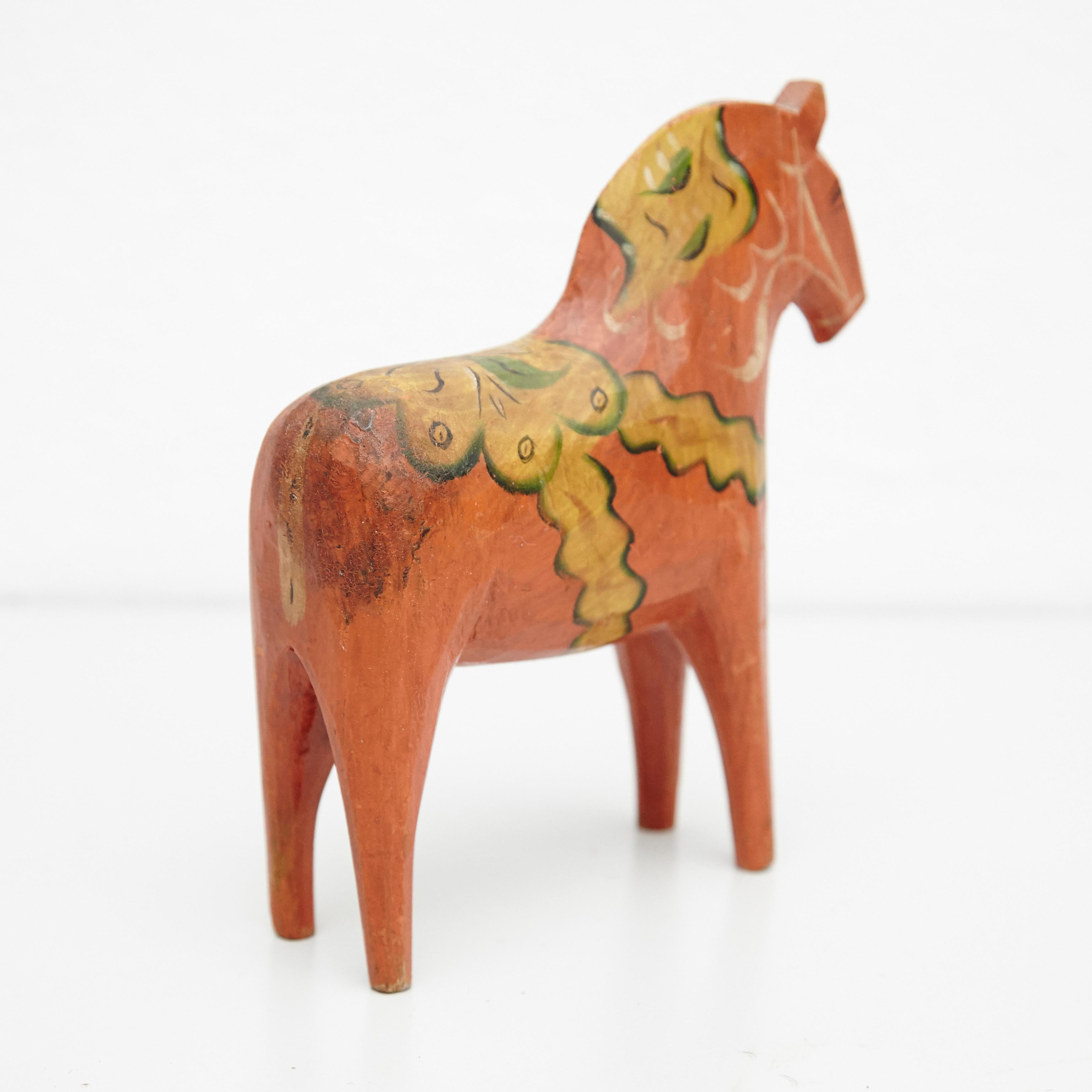 Swedish wooden horse toy
by unknown manufacturer, Sweden, circa 1920.

In original condition, with minor wear consistent with age and use, preserving a beautiful patina.

Materials:
Wood

Dimensions:
D 5 cm x W 16.5 cm x H 19 cm.