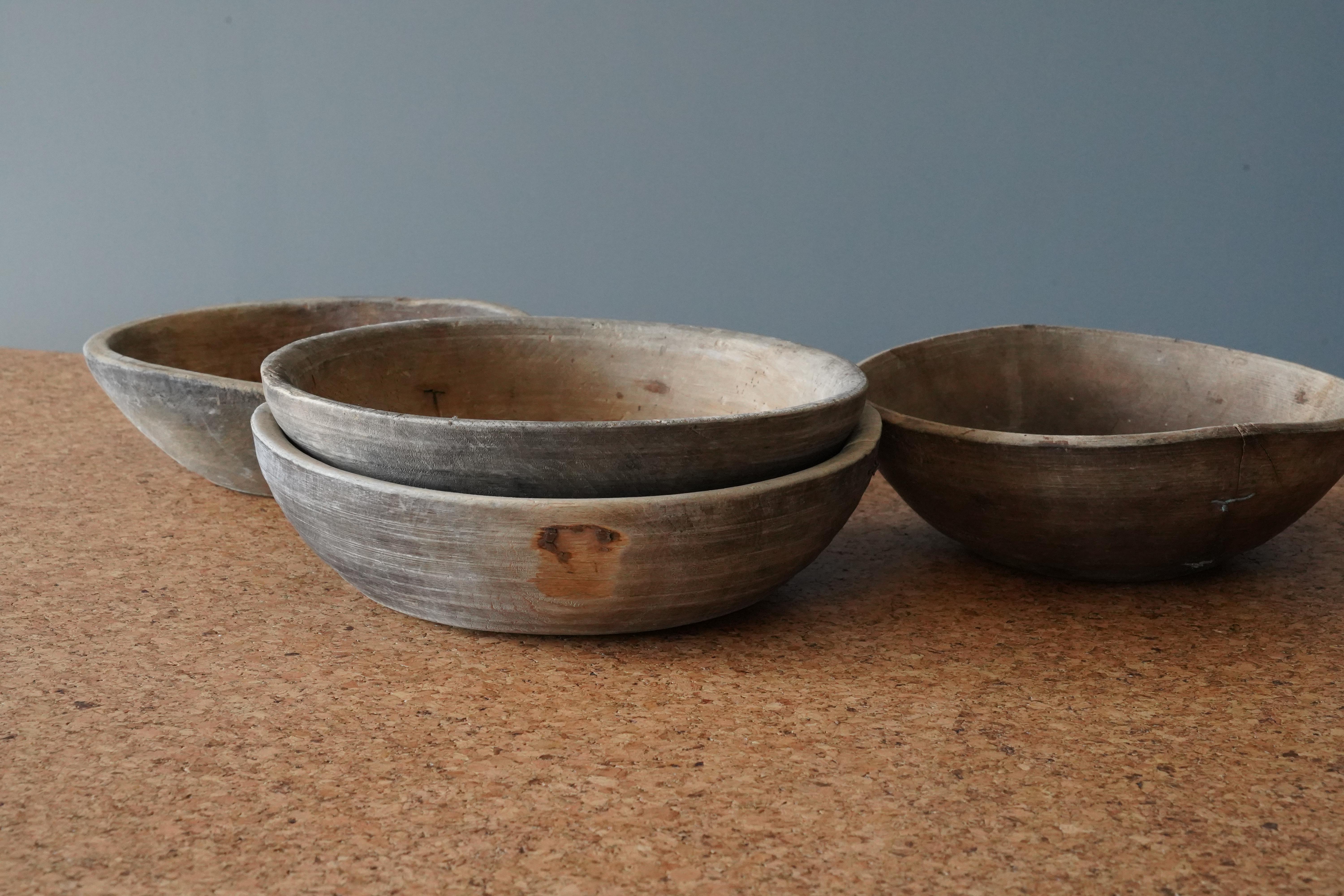 A set of four antique Swedish folk craft bowls, 19th century, executed early 20th century.

   