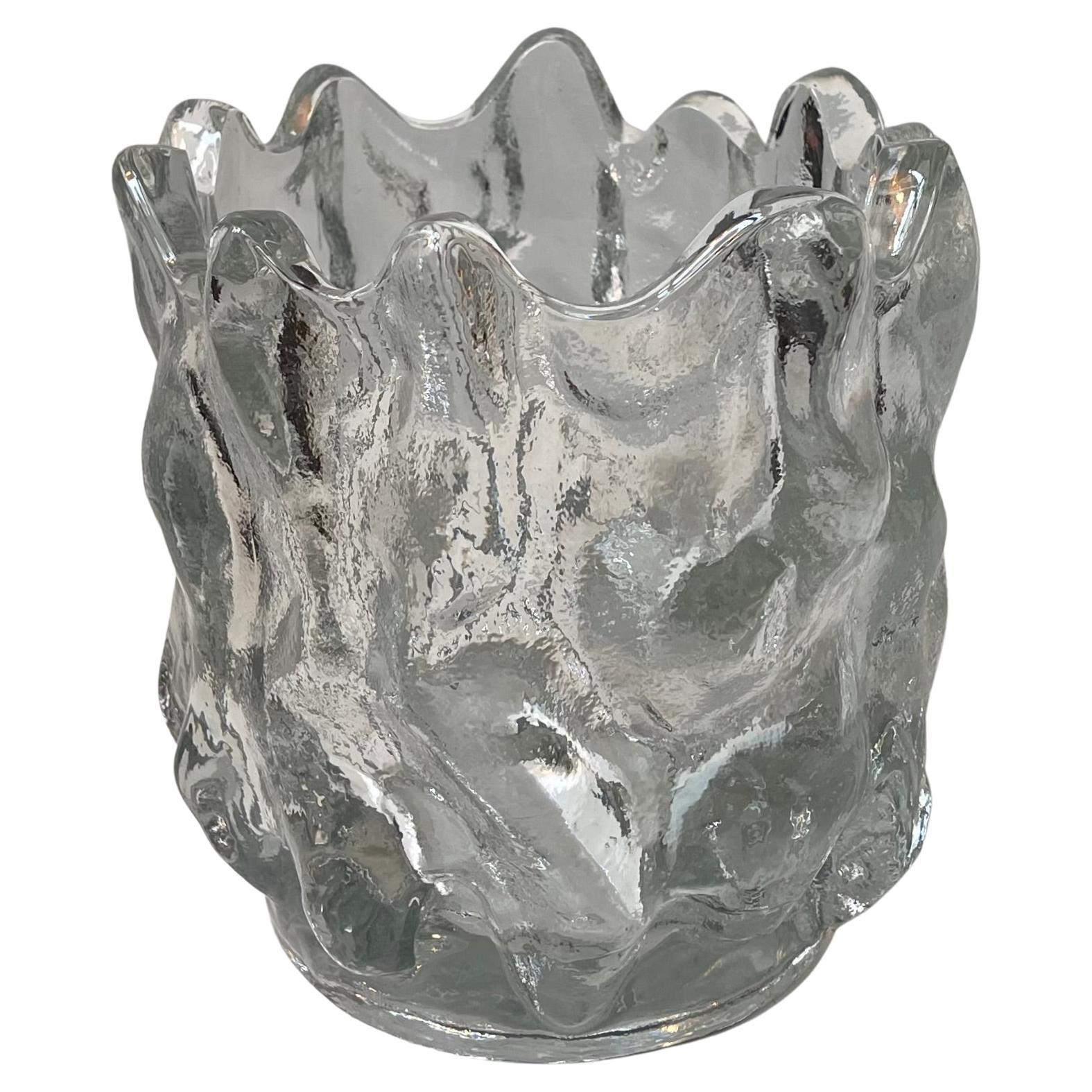 A large freeform vase in organically molded crystal glass. It is probably a unique piece designed by the conic Swedish glass wizard Göran Wärff in 1987. Signed beneath its base: Kosta Boda 1987 by hand. It resembles the ice glass technique of polar