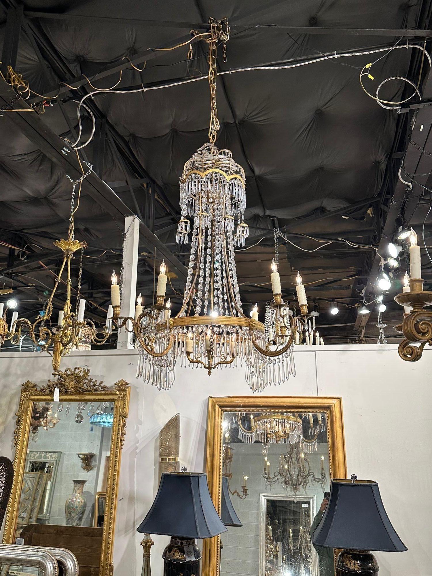 Fine 19th century bronze and crystal chandelier, circa 1870. The chandelier has been professionally rewired, comes with matching chain and canopy. It is ready to hang!