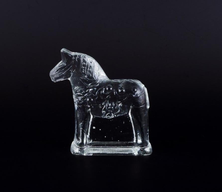 Suédois Artiste verrier suédois. Quatre chevaux Dala en verre d'art soufflé à la bouche transparent, années 1970 en vente