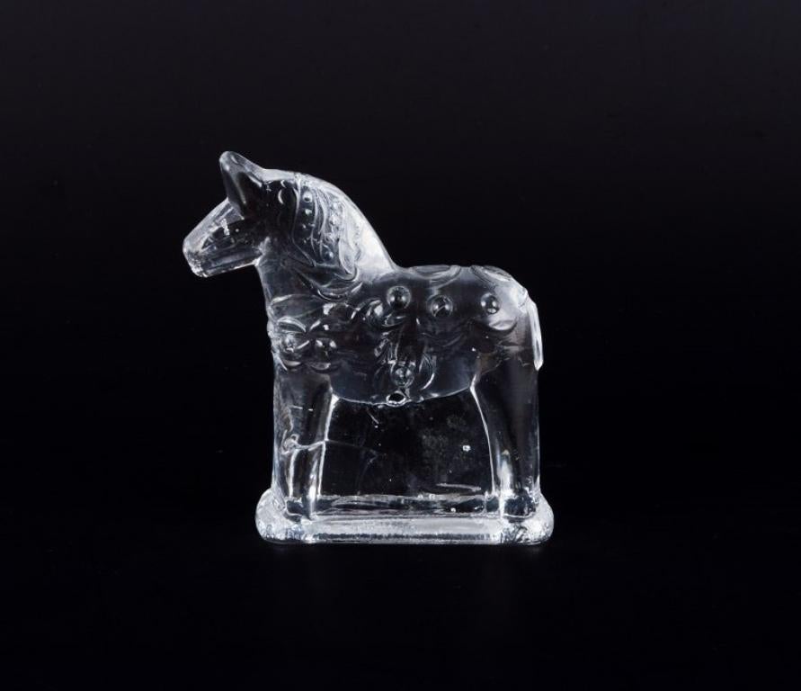Swedish glass artist. Four Dala horses in clear mouth-blown art glass. 1970s In Excellent Condition For Sale In Copenhagen, DK