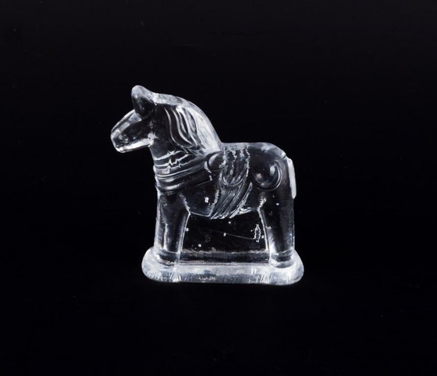 Swedish glass artist. Four Dala horses in clear mouth-blown art glass.  In Excellent Condition For Sale In Copenhagen, DK