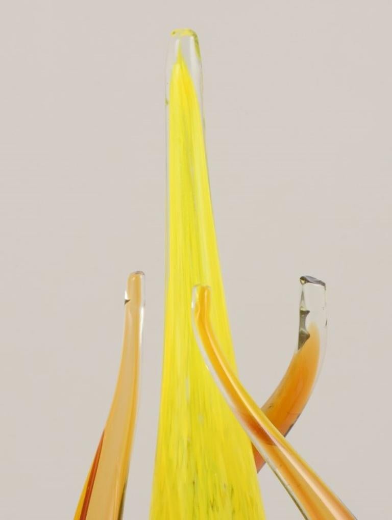 20th Century Swedish glass artist. Large sculpture in art glass. Yellow and amber decoration. For Sale