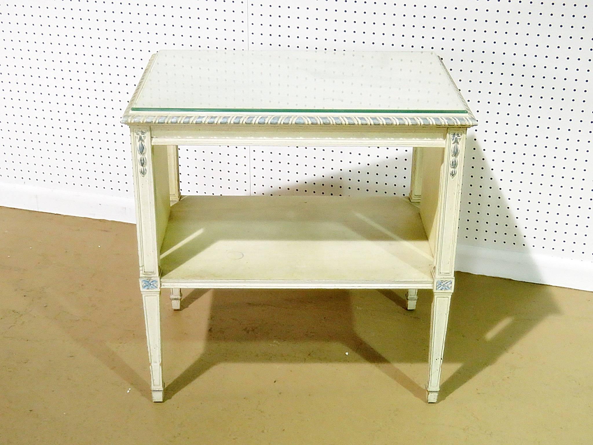Swedish two-tier end table with distressed paint and a beveled glass top.