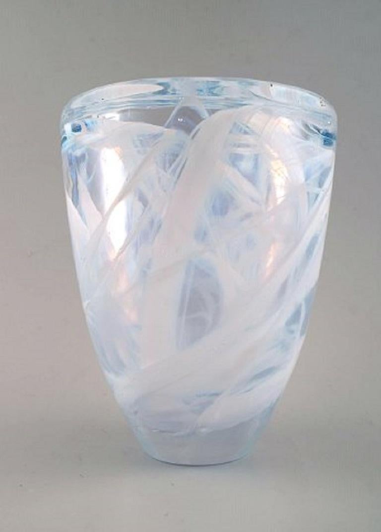 Swedish glass vase in clear glass.
Designed in the 1970s-1980s.
Measures: Height 19 cm., diameter 15 cm.
In perfect condition.
Unsigned.