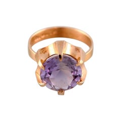 Swedish Goldsmith, 18 Carat Gold Ring Adorned with Purple Semi Precious Stone