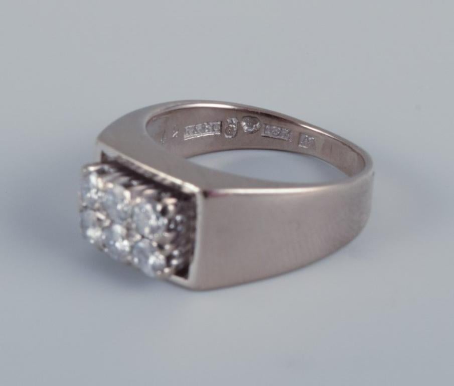 Swedish goldsmith. Diamond ring in 18-karat white gold.
A total of six diamonds with a total weight of 0.42 carats.
From the mid-20th century.
In perfect condition.
Hallmarked.
Ring size: 15 mm. - US size 4.25
