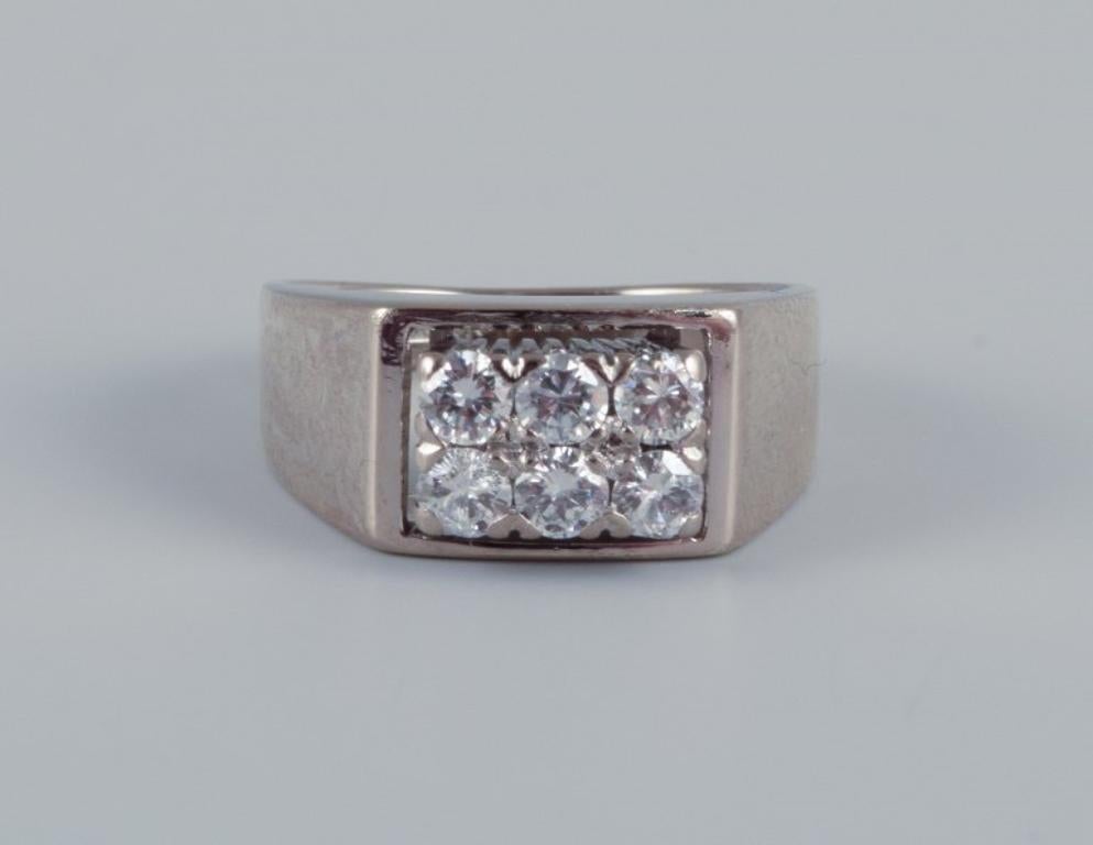 Women's Swedish goldsmith. Diamond ring in 18 karat white gold. Total of six diamonds.