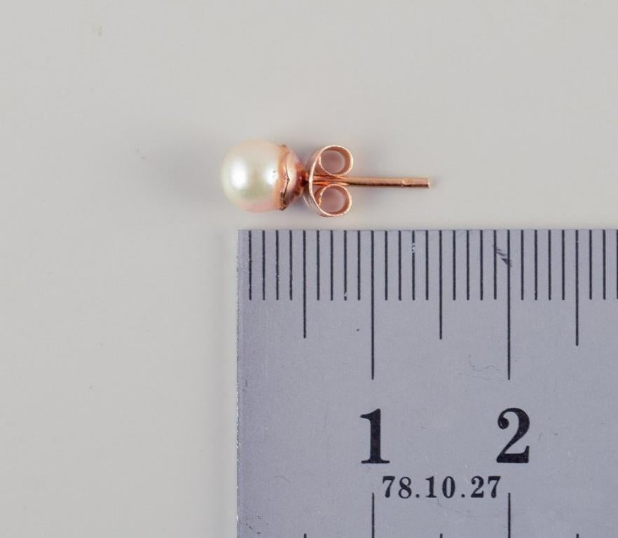Women's Swedish goldsmith. Pair of ear studs in gold with cultured pearls. For Sale