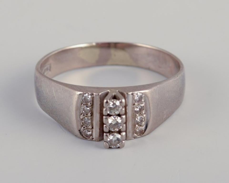 Women's Swedish goldsmith. Ring in 18-karat white gold adorned with eleven diamonds. For Sale