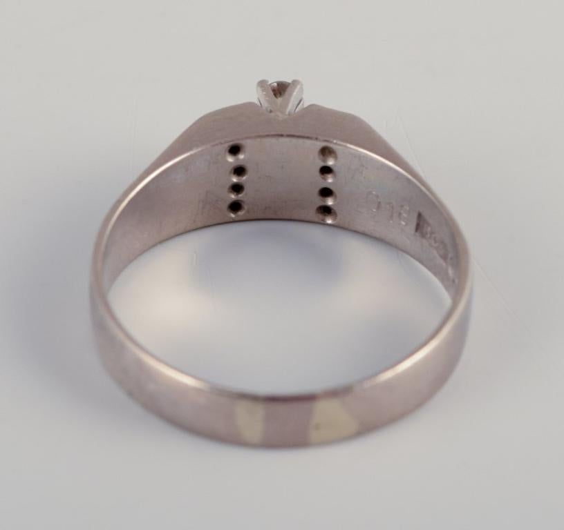 Swedish goldsmith. Ring in 18-karat white gold adorned with eleven diamonds. For Sale 3