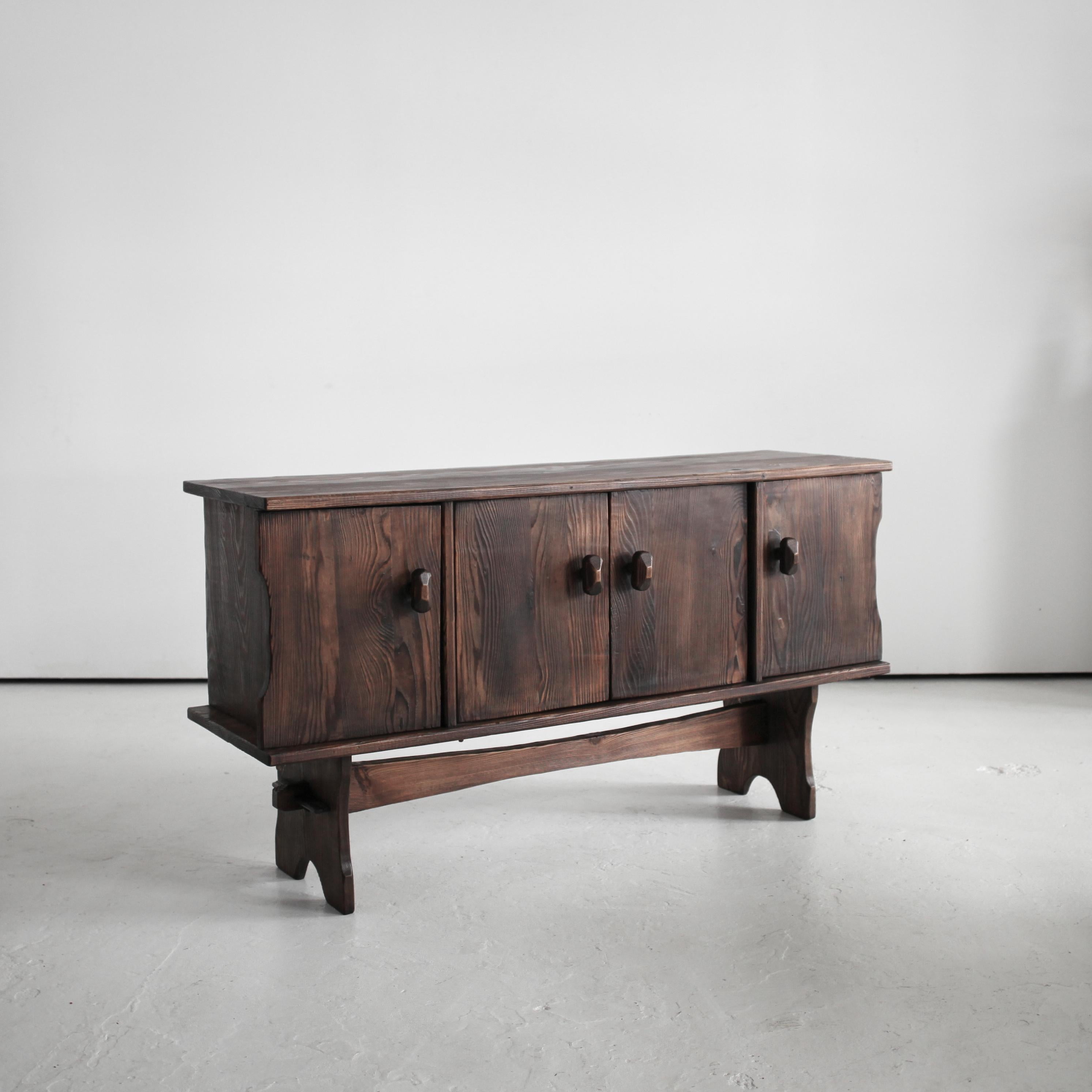 A heavily textured Swedish “gouged” pine sideboard.

Simple well executed design, constructed almost entirely using wooden dowels and pegs (rather than nails).

Reminiscent of the works of Axel Einar Hijorth & the textured finishes of the Marrolles