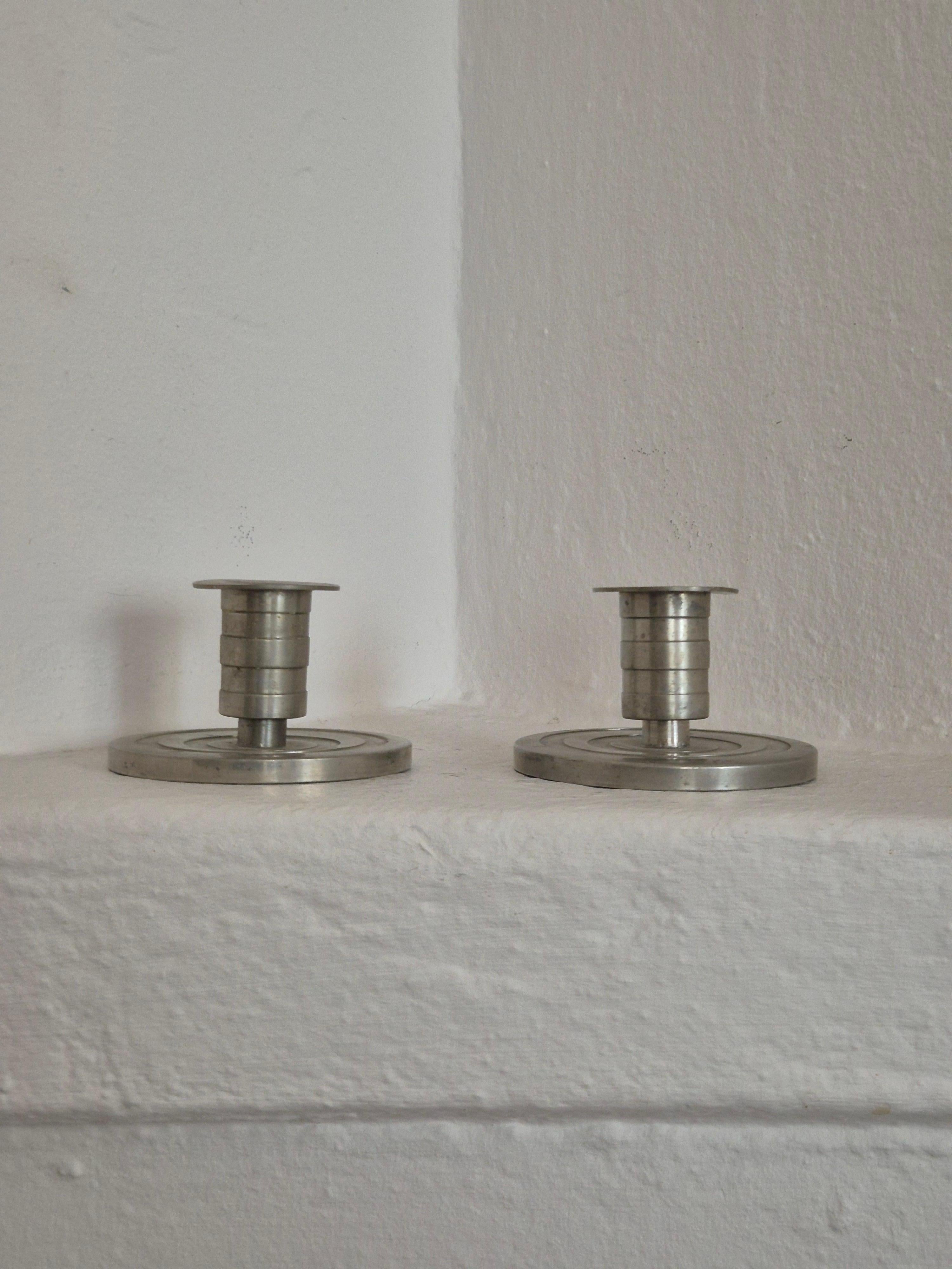 Art Déco Swedish Grace / Art Deco candle holders in pewter by Sylvia Stave, 1933. in vendita