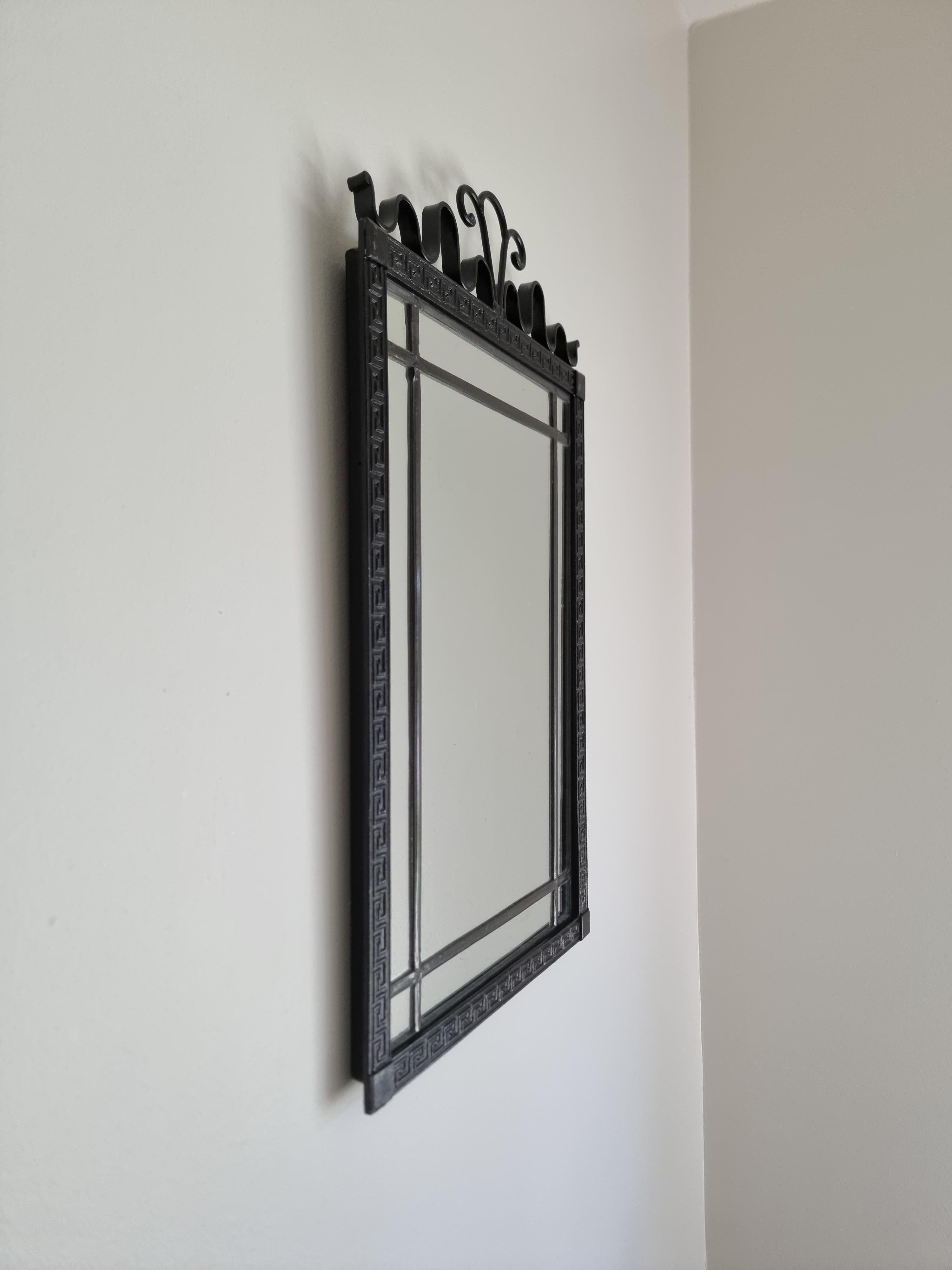 Mid-20th Century Swedish Grace / Art Deco, mirror in cast iron with meander patterned frame