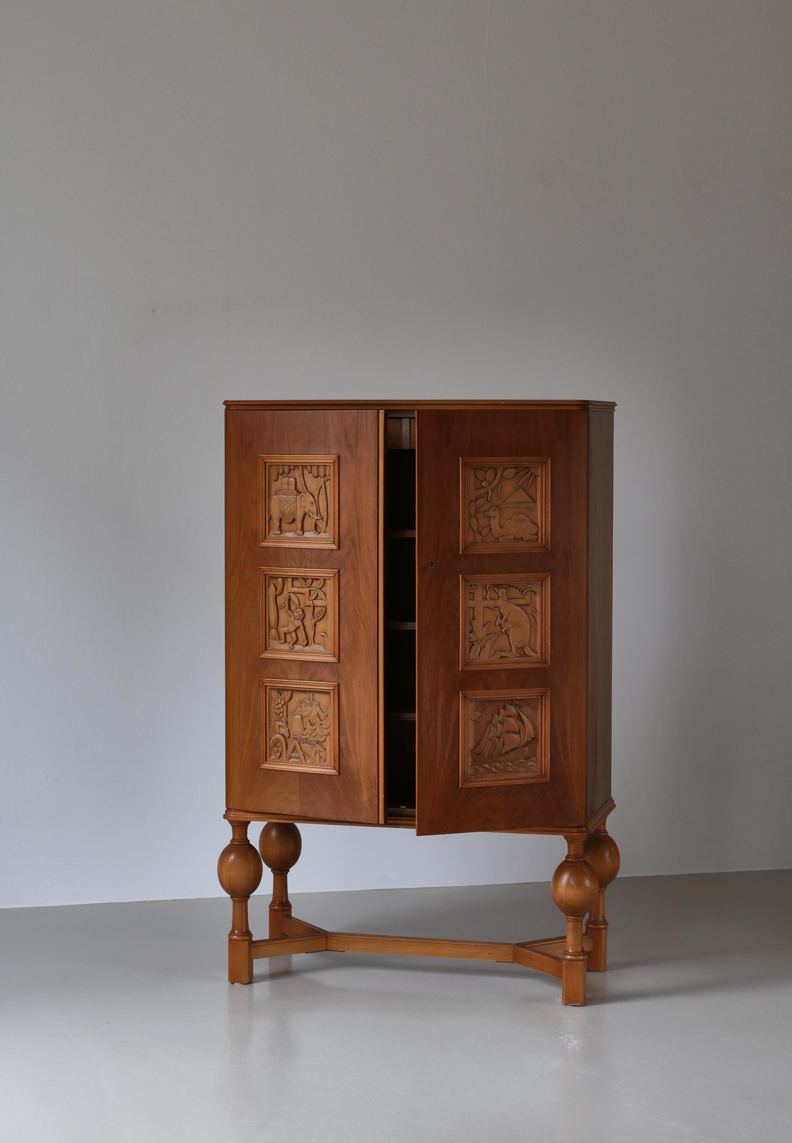 Beech Swedish Grace Cabinet with Carved Decor by Eugen Höglund, Vetlanda, Sweden, 1930 For Sale
