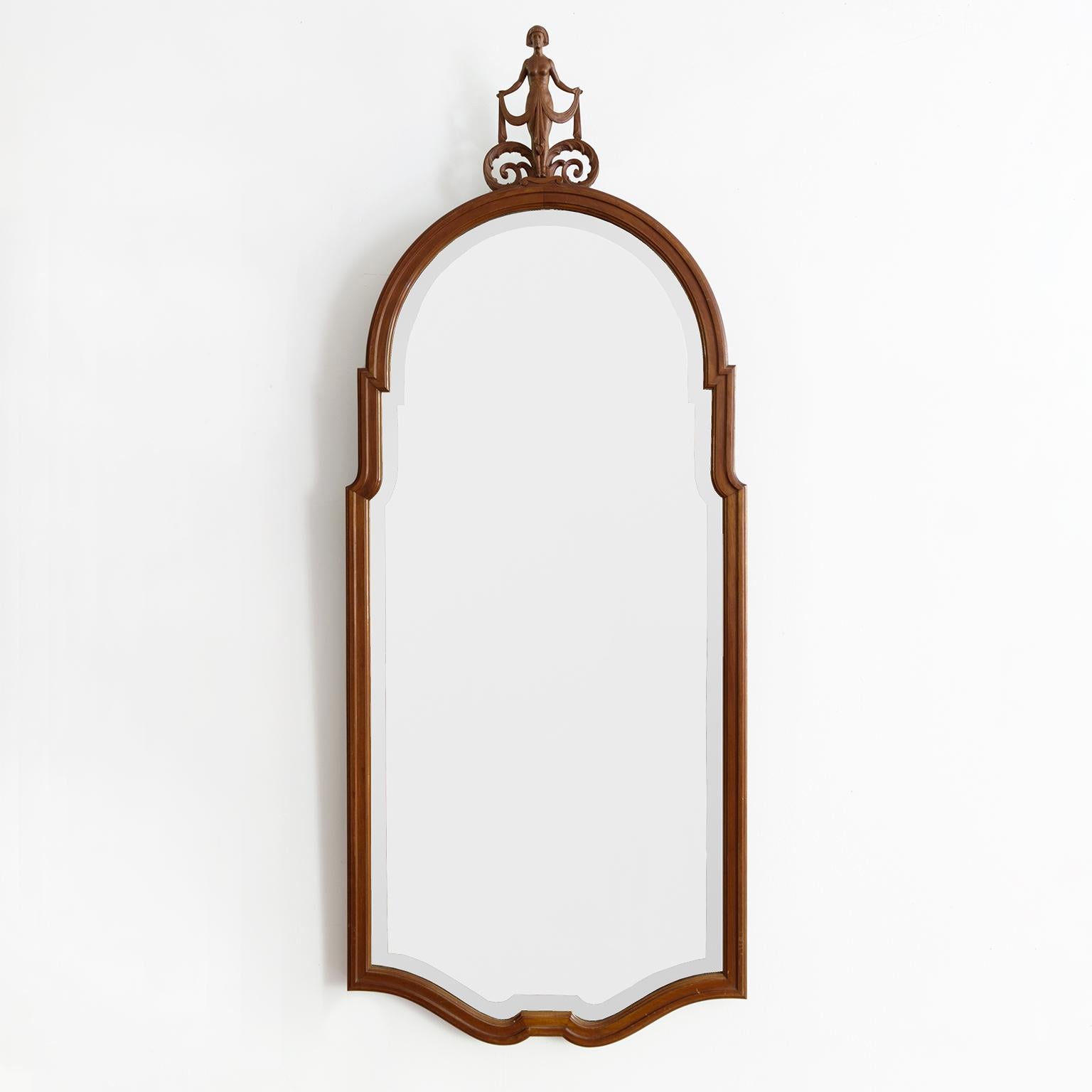 Swedish Grace mirror with carved mahogany frame topped with a female figure dressed in the Egyptian style. Fine quality, design and maker currently unknown. Created circa 1920-30.

Measures: Height: 60”, width: 19.75”. depth: 1.5.