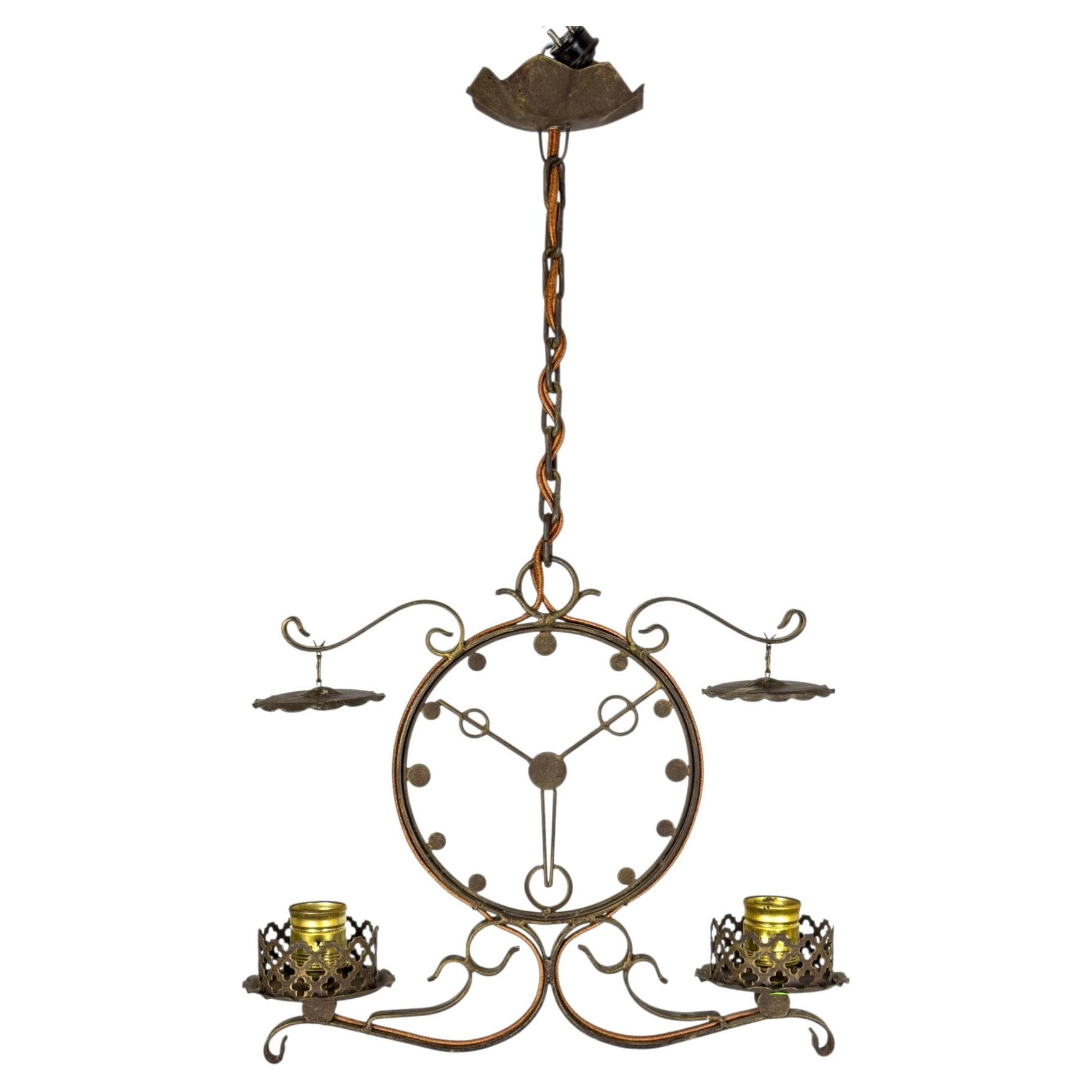 Swedish Grace Hand-Forged Wrought Iron Chandelier with Clock Motif, Sweden, 1920 For Sale