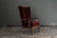 Swedish Grace High-Back Armchair in Velvet with Brass Armrests, c. 1930