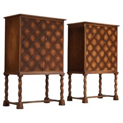 Swedish Grace High-Legged Pair of Cabinets with Carved Elements in Oak