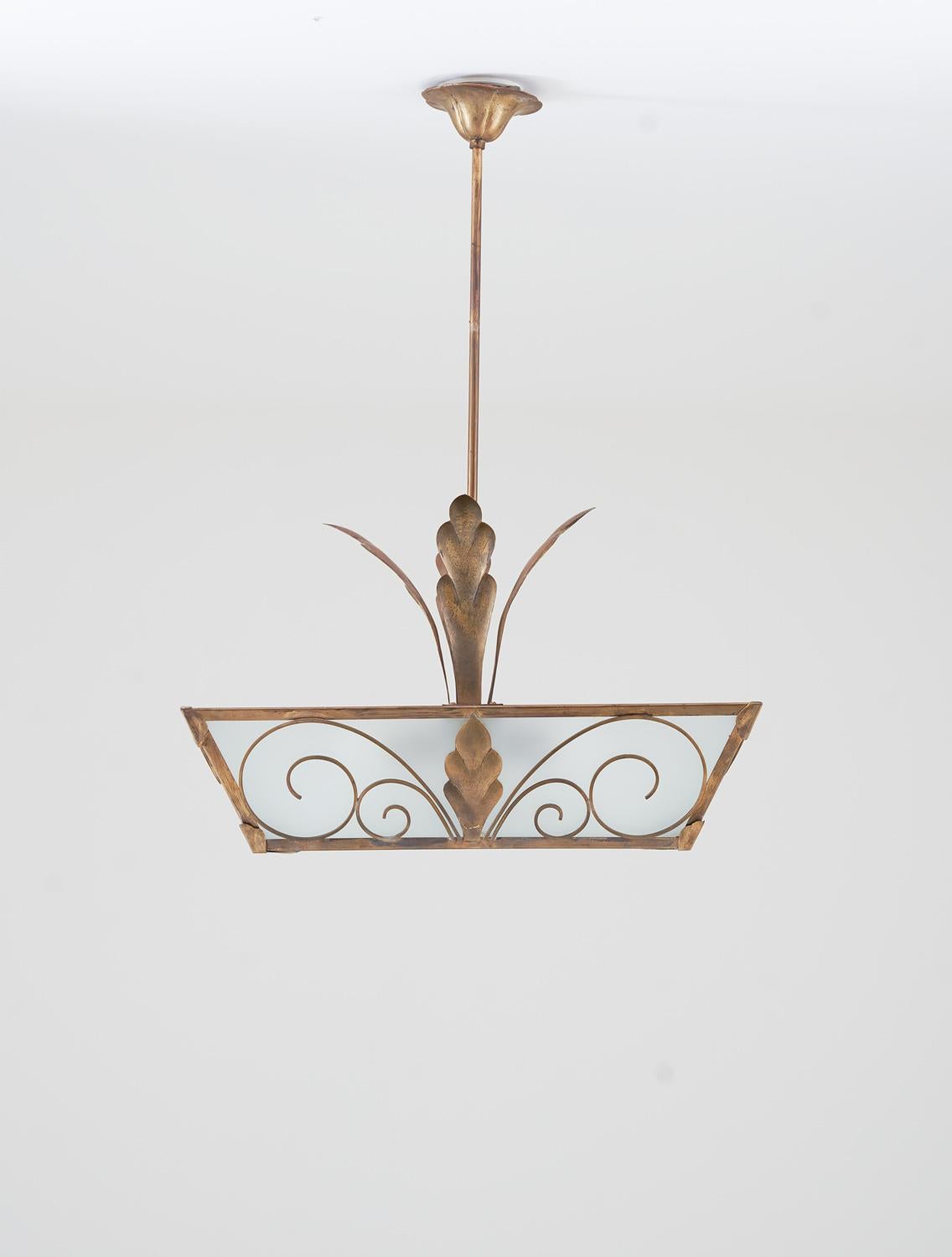 Custom made ceiling light fixture by Lars Holmström, Arvika, Sweden.
This majestic lamp features two light sources and is made of brass and glass.
Lars Holmström is known as being one of the most skilled blacksmiths at the time and made many