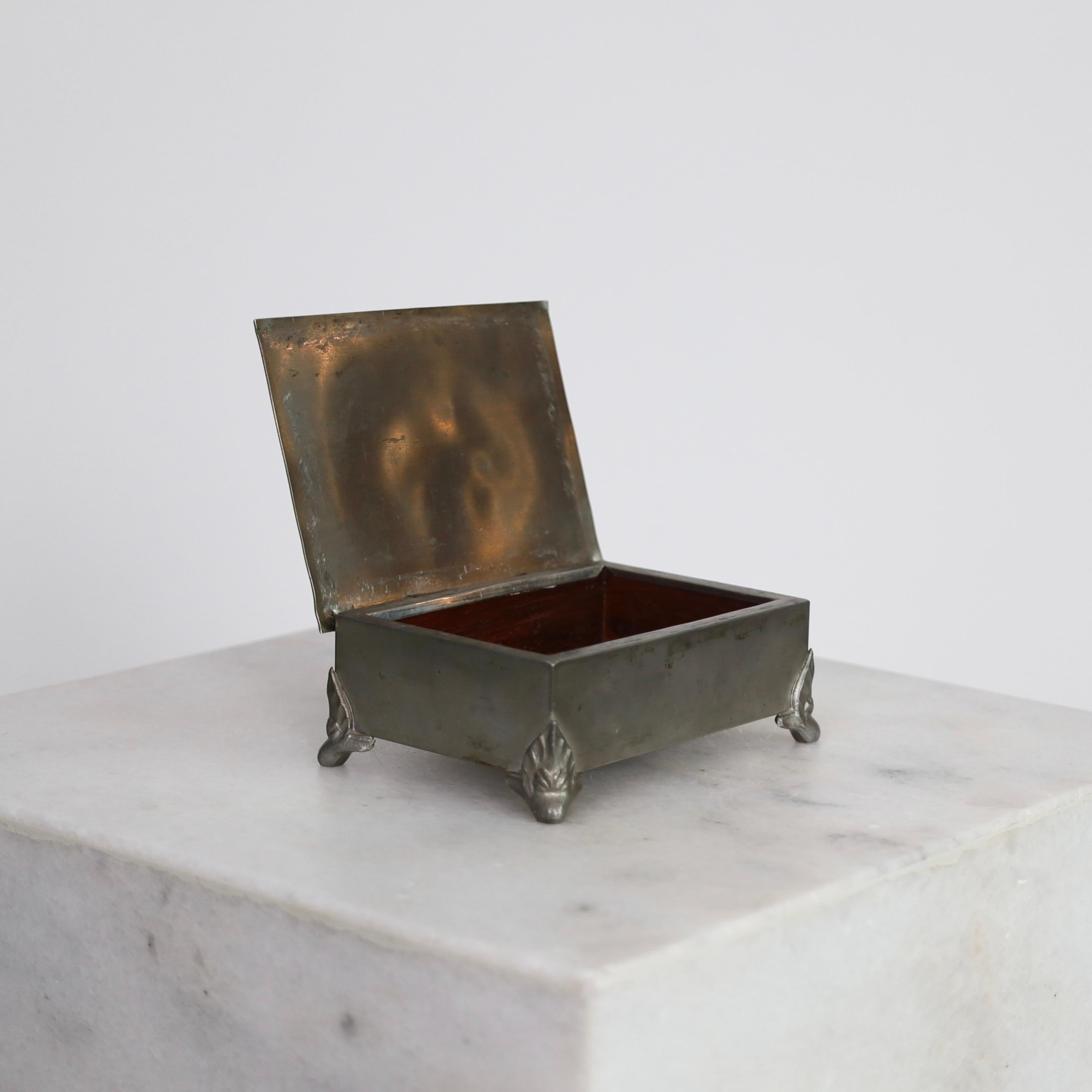 Swedish Grace Pewter Box designed by Thorild Knutsson circa 1940. An elegant piece for a beautiful place.

* A small lidded box in pewter with a wooden inner box.
* Designer: Thorild Knutson
* Manufacturer: Thorild
* Year: est. 1940s
* Condition: