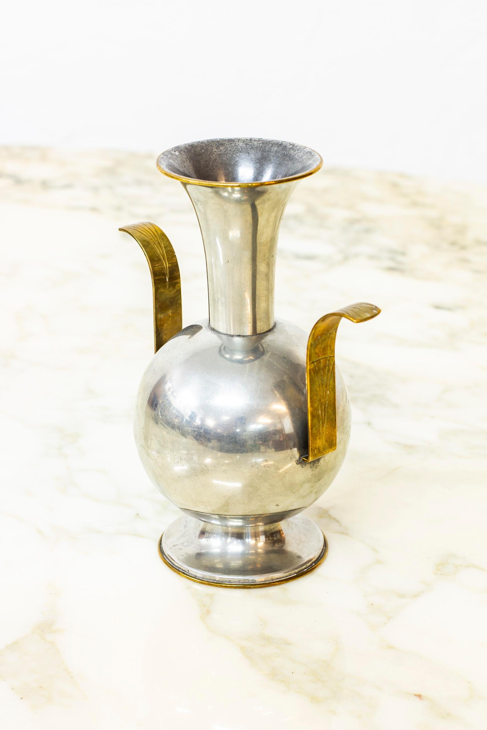 Vase designed and made by Art Smith Thorild Knutson in 1930. Made from brass and pewter. Good vintage condition with wear and patina according to age and use.