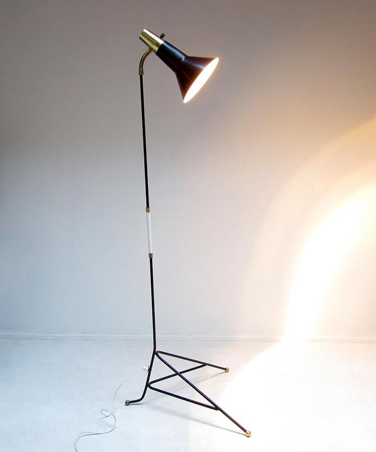 A 1960s grasshopper floor lamp by Swedish designer Svend Aage Holm Sørensen for ASEA.

The modernist form, brass detail and articulated shade combine to make a striking statement.

It is in excellent condition. The ASEA maker label is affixed to