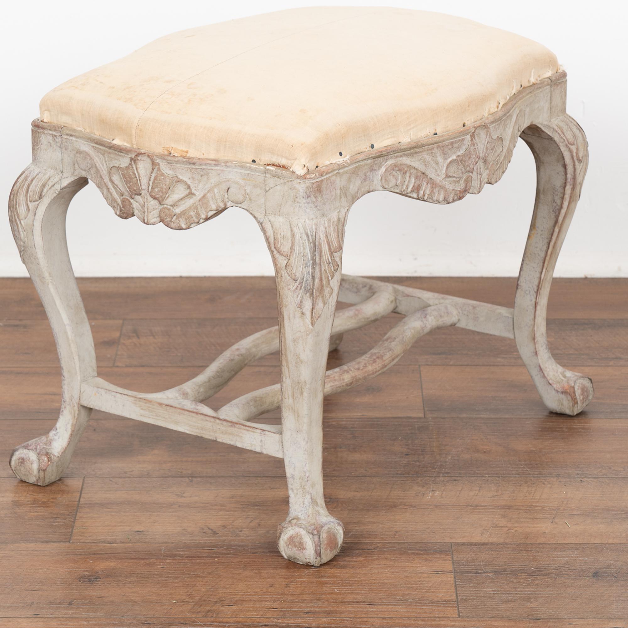 This Swedish stool or tabouret has curved cabriolet legs with ball and claw feet and carving along the skirt and legs which adds an elegant touch.
Restored, solid/stable and ready to be enjoyed. Later professionally painted in layered shades of gray