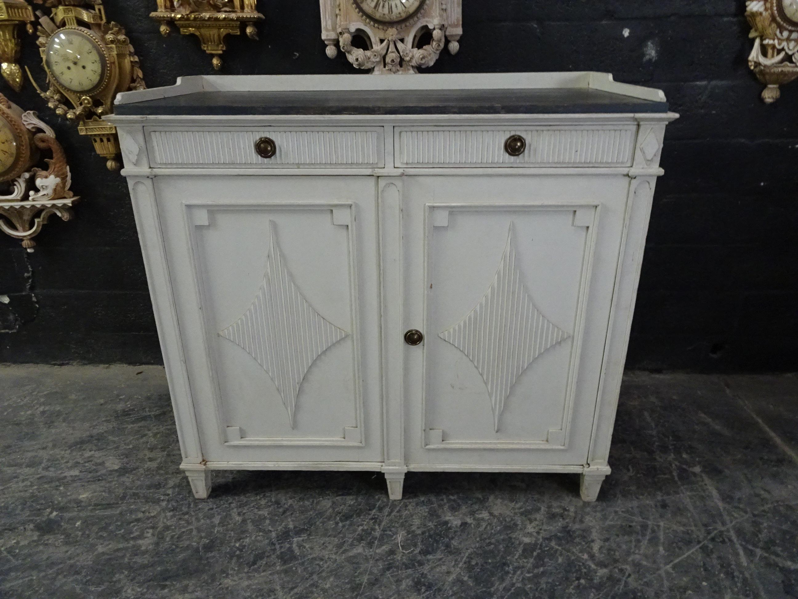 This is a Swedish Gustavain Sideboard. it was found at an estate auction in Stockholm, Sweden.