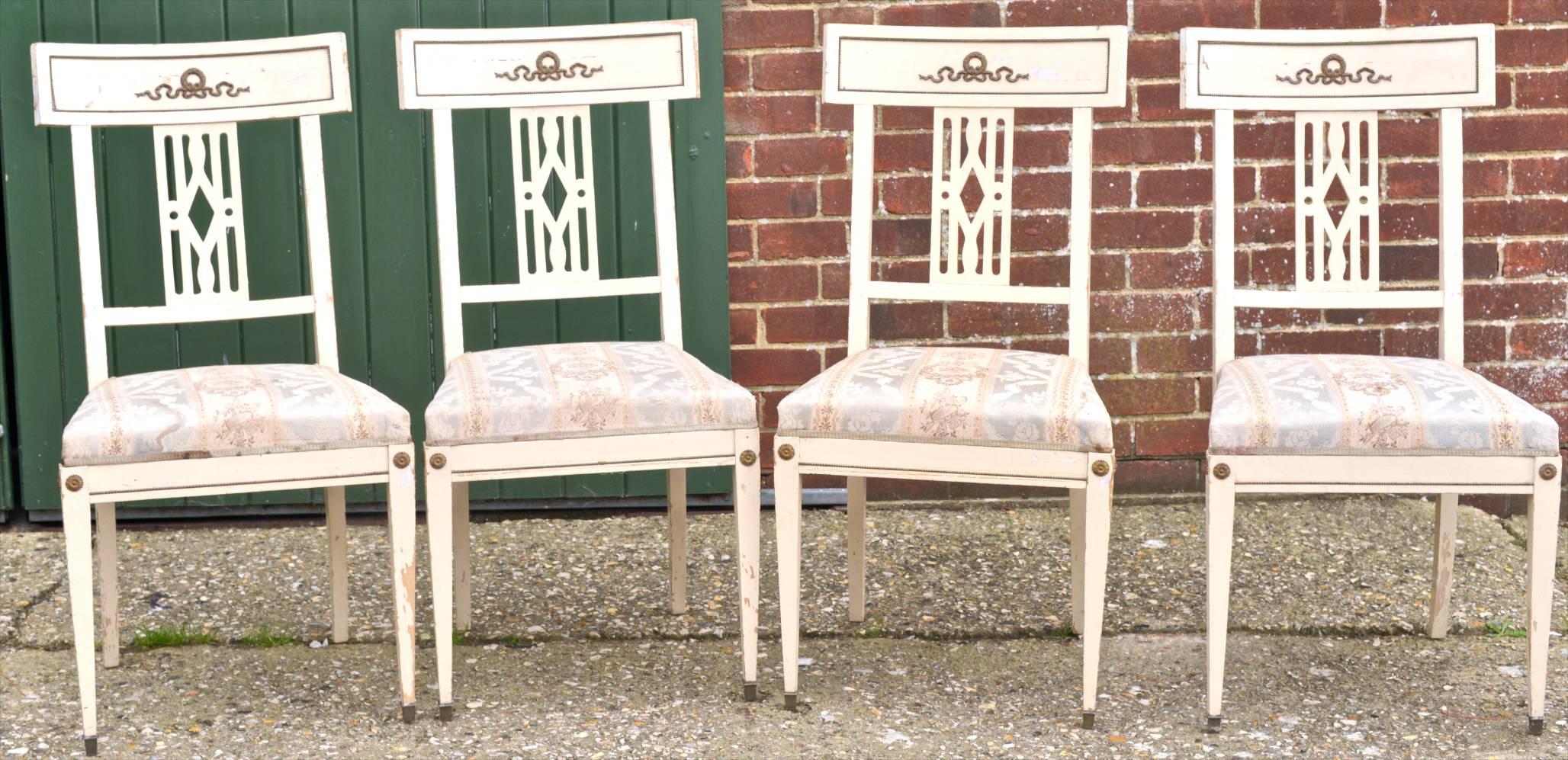 Set of six late 19th century antique Swedish Gustavian Bellman dining chairs with webbed seats and lovely brass style detailing on backrest and at the top of the pyramid legs. Very hard to find as a set of six or even four now. There is paint