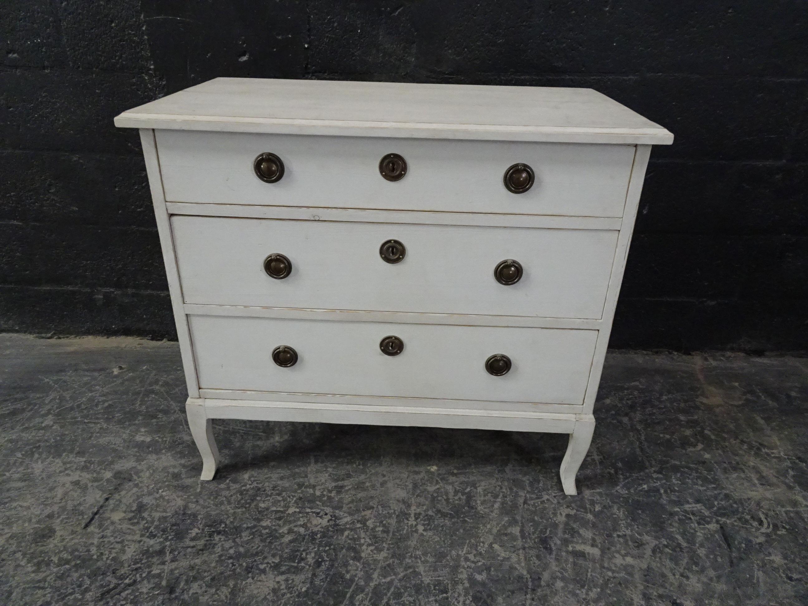 This is a Swedish Gustavian chest of drawers, its been restored and repainted with milk paints 
